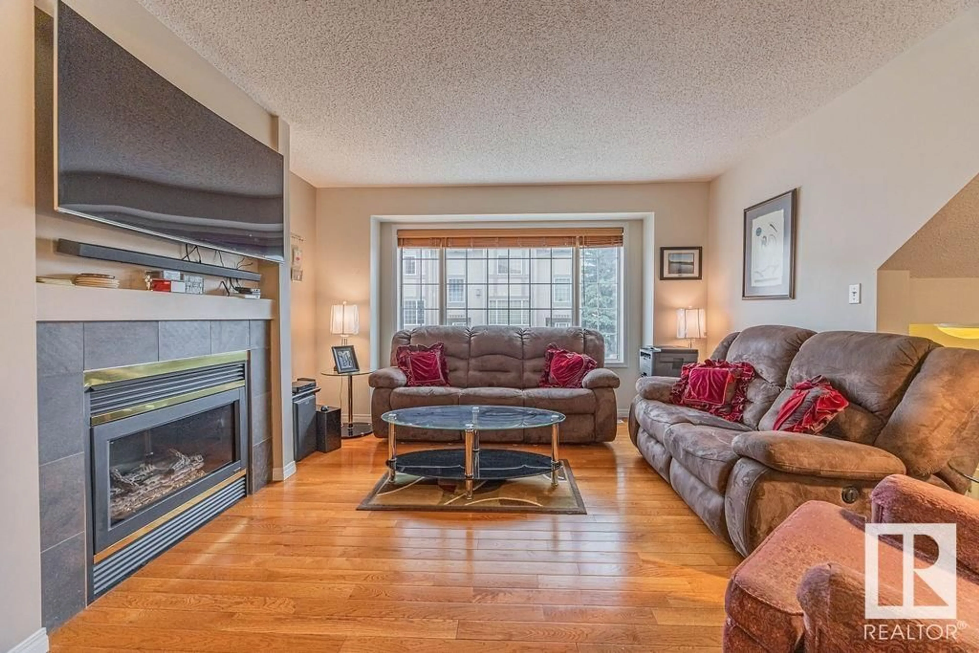 Living room with furniture, unknown for 17616 96 AV, Edmonton Alberta T5T6C2