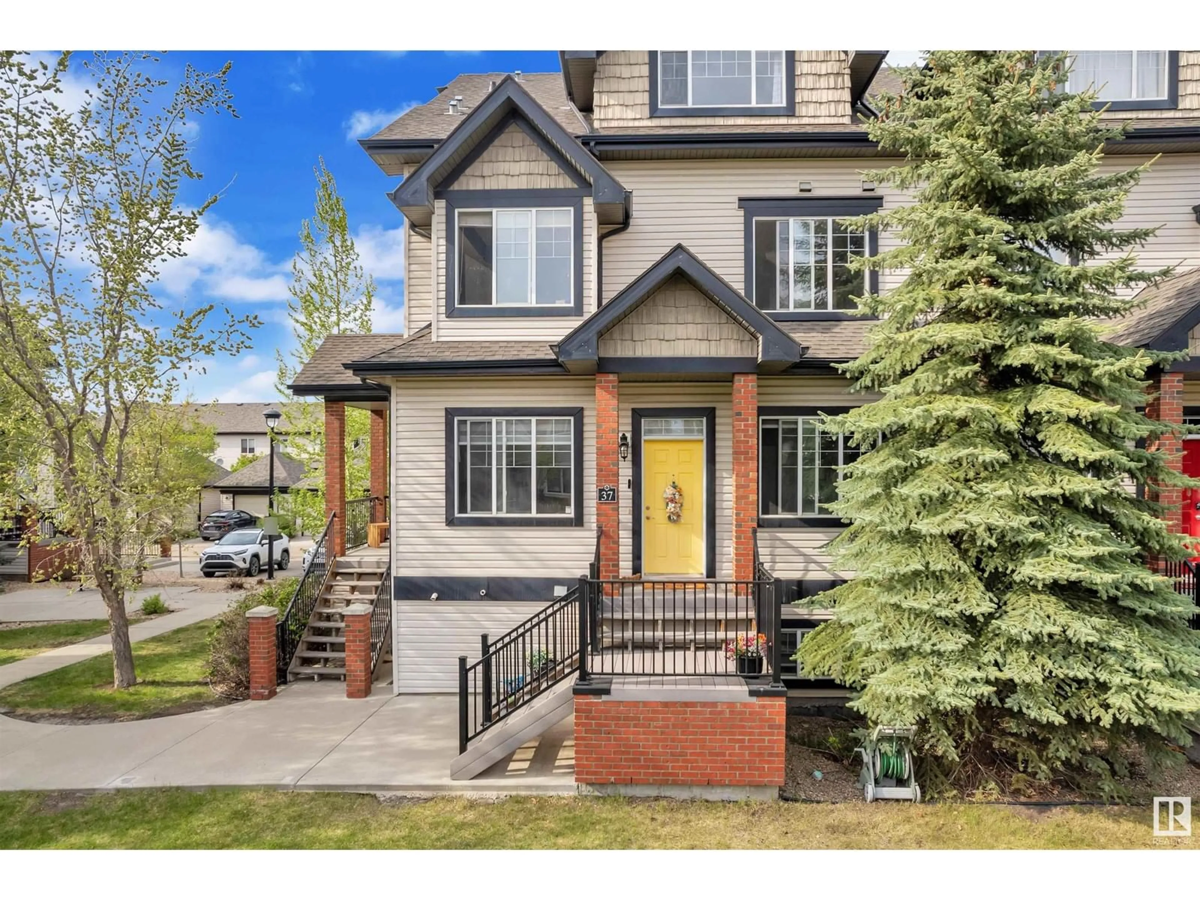 Home with brick exterior material, street for #37 - 4821 TERWILLEGAR CM, Edmonton Alberta T6R0C5