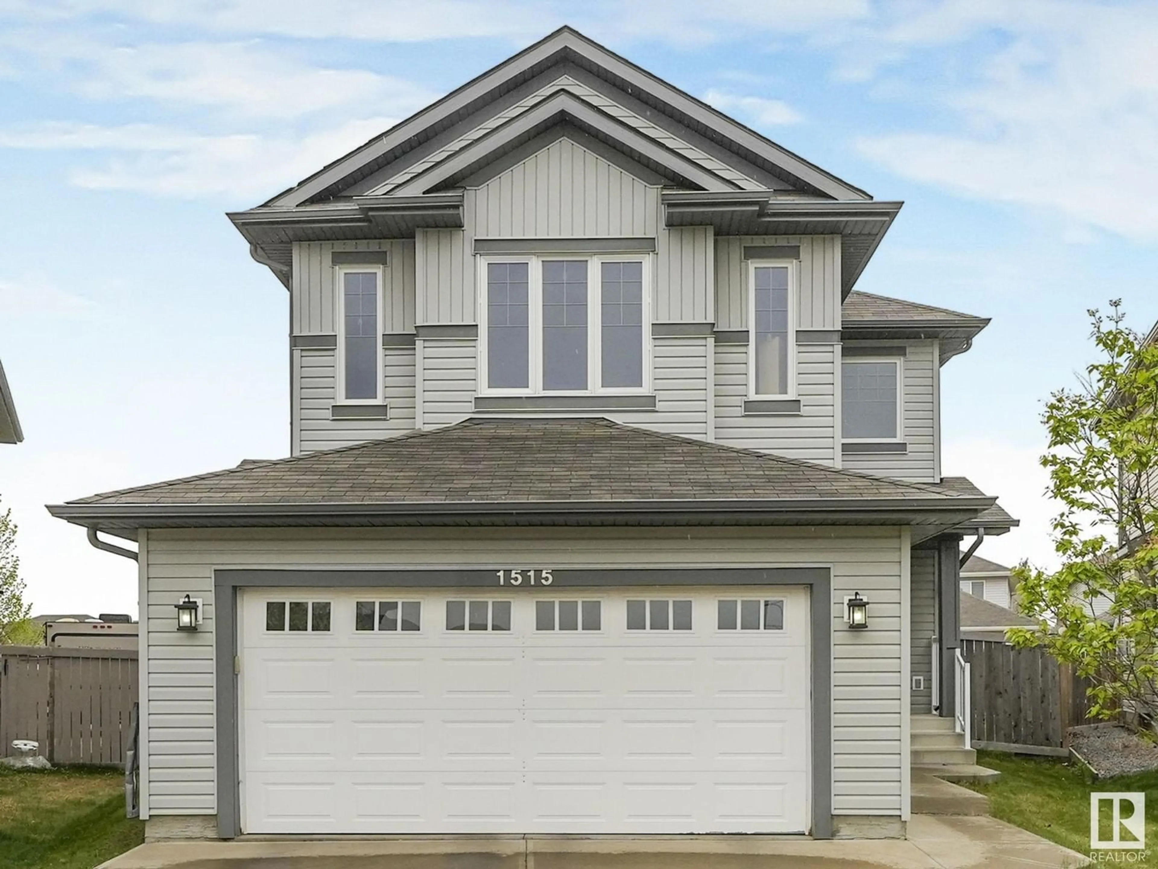 Home with vinyl exterior material, street for NW - 1515 36 AVENUE, Edmonton Alberta T6T0M4