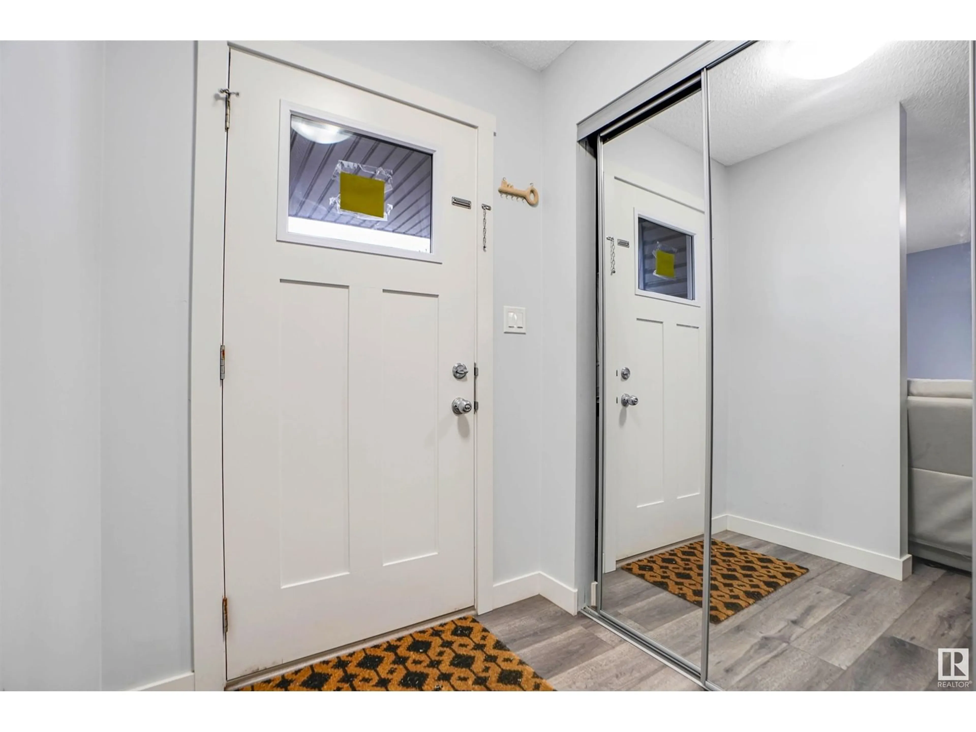 Indoor entryway for 2611 14 AV, Edmonton Alberta T6T2J2