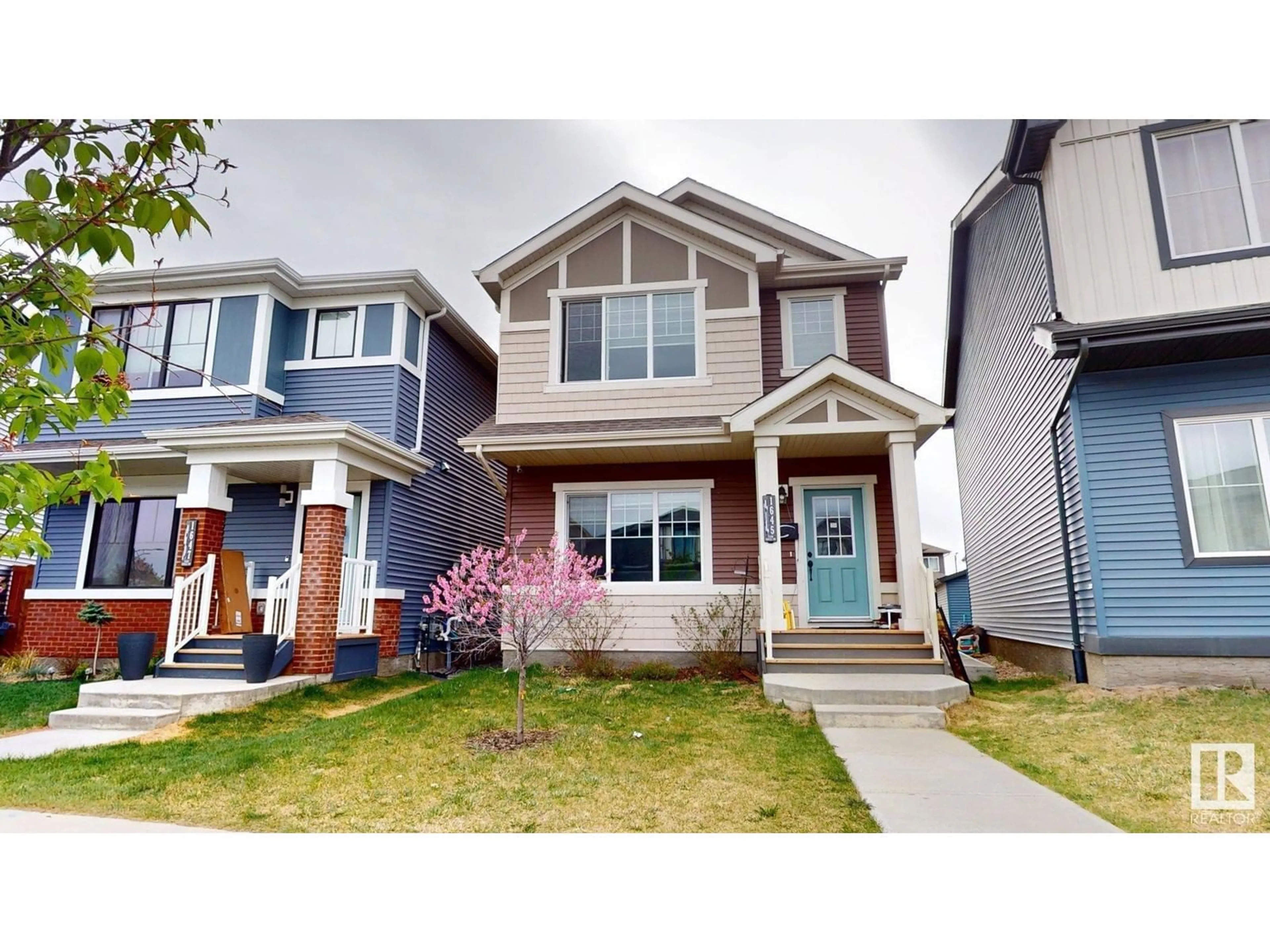 Home with vinyl exterior material, street for CI SW - 1645 PLUM CIRCLE, Edmonton Alberta T6X2Y5