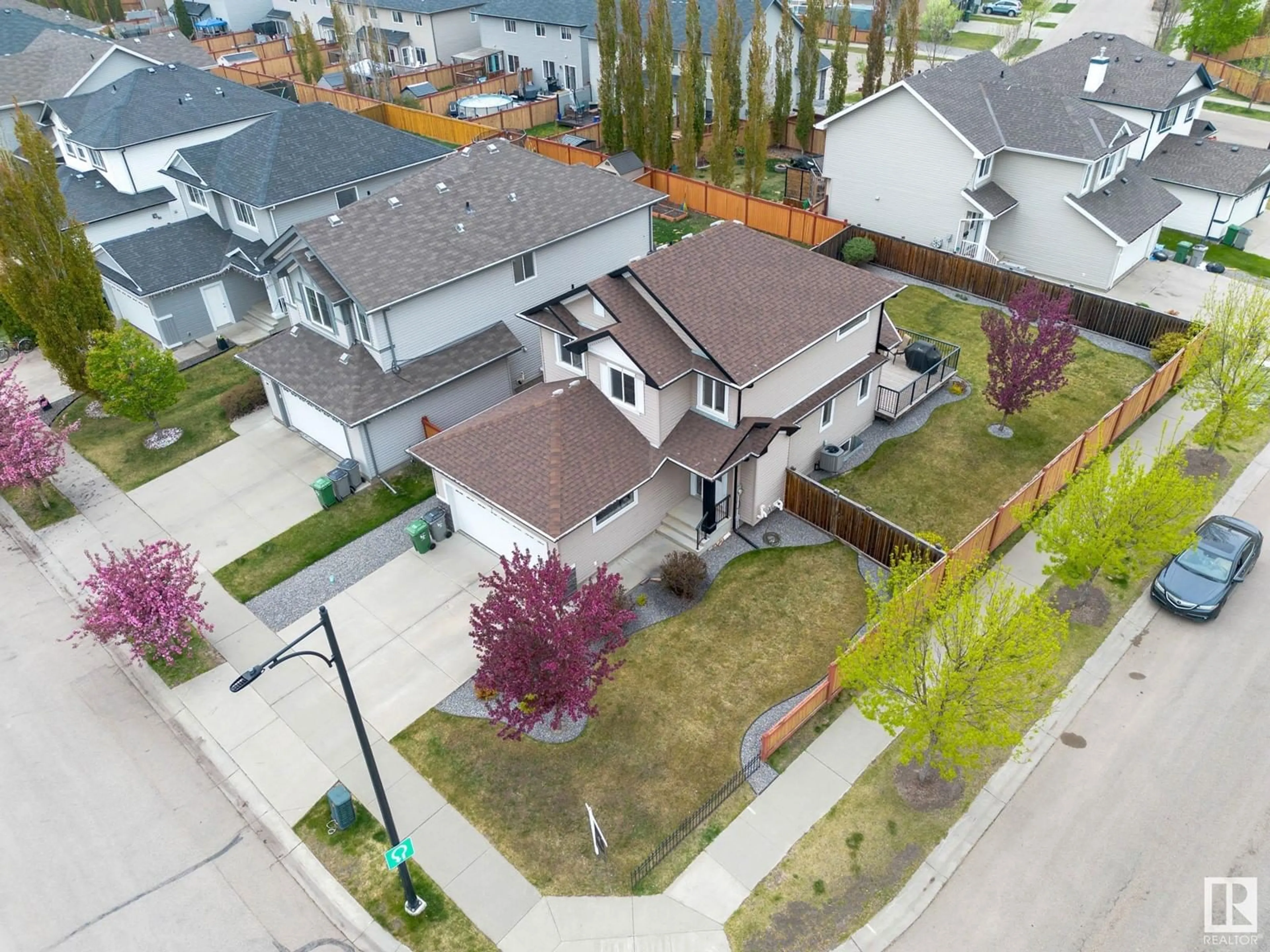 A pic from outside/outdoor area/front of a property/back of a property/a pic from drone, street for 102 POINTE MARSAN, Beaumont Alberta T4X0A2