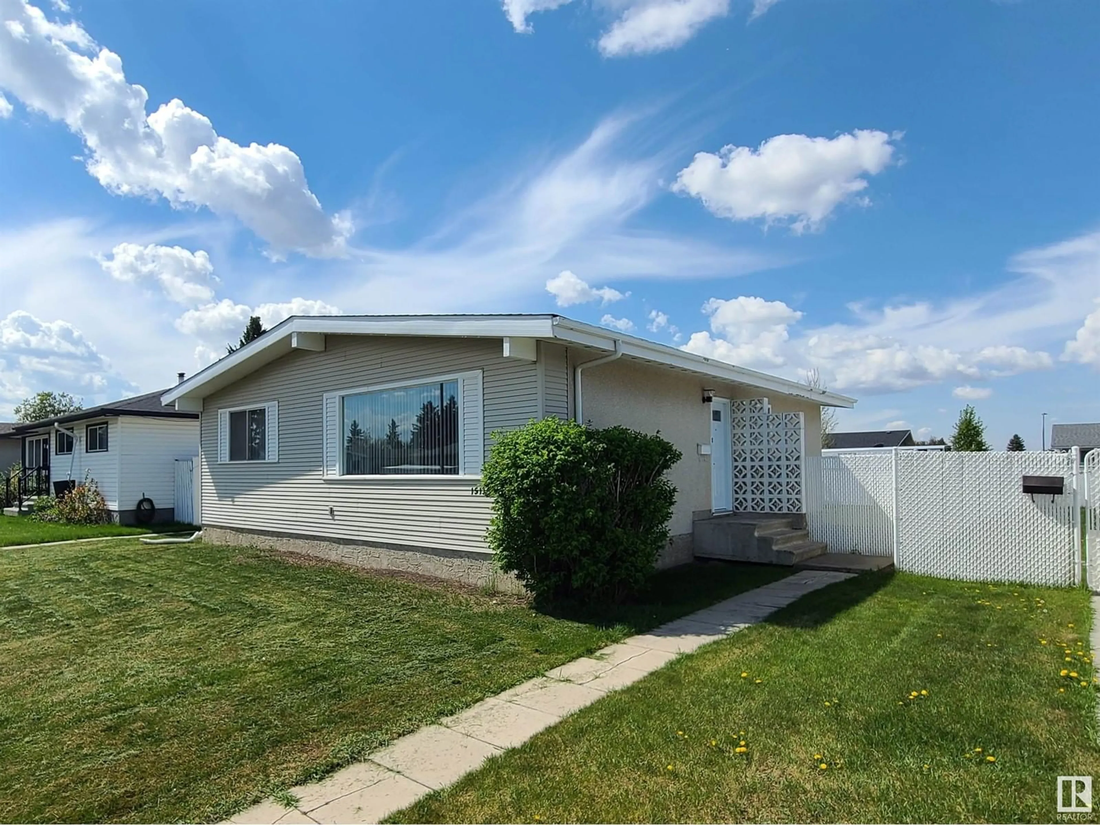 Home with vinyl exterior material, street for 15116 75A ST NW, Edmonton Alberta T5C1A7