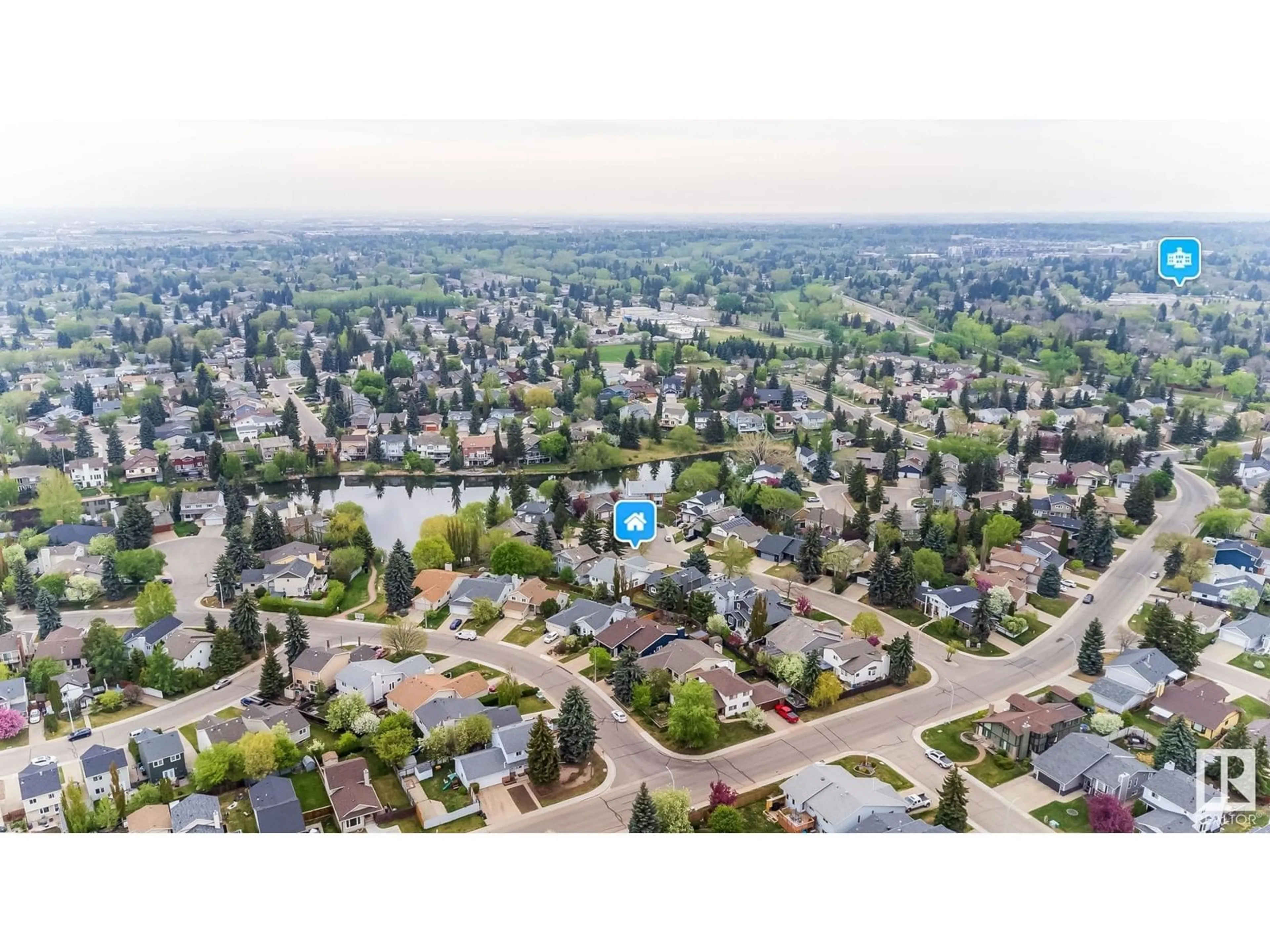 A pic from outside/outdoor area/front of a property/back of a property/a pic from drone, street for 182 VILLAGE ESTATE, Sherwood Park Alberta T8A4P5