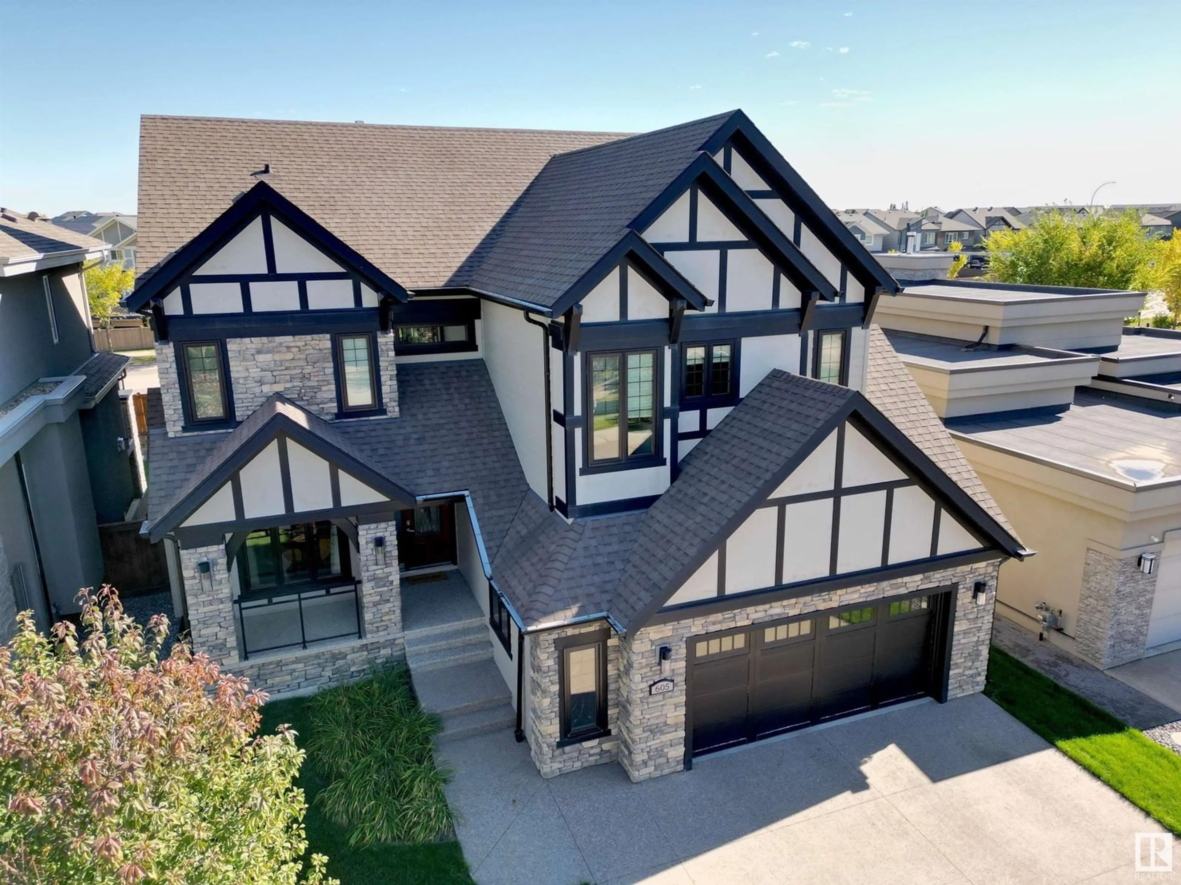 Home with brick exterior material, street for 605 HOWATT DR, Edmonton Alberta T6W2T6
