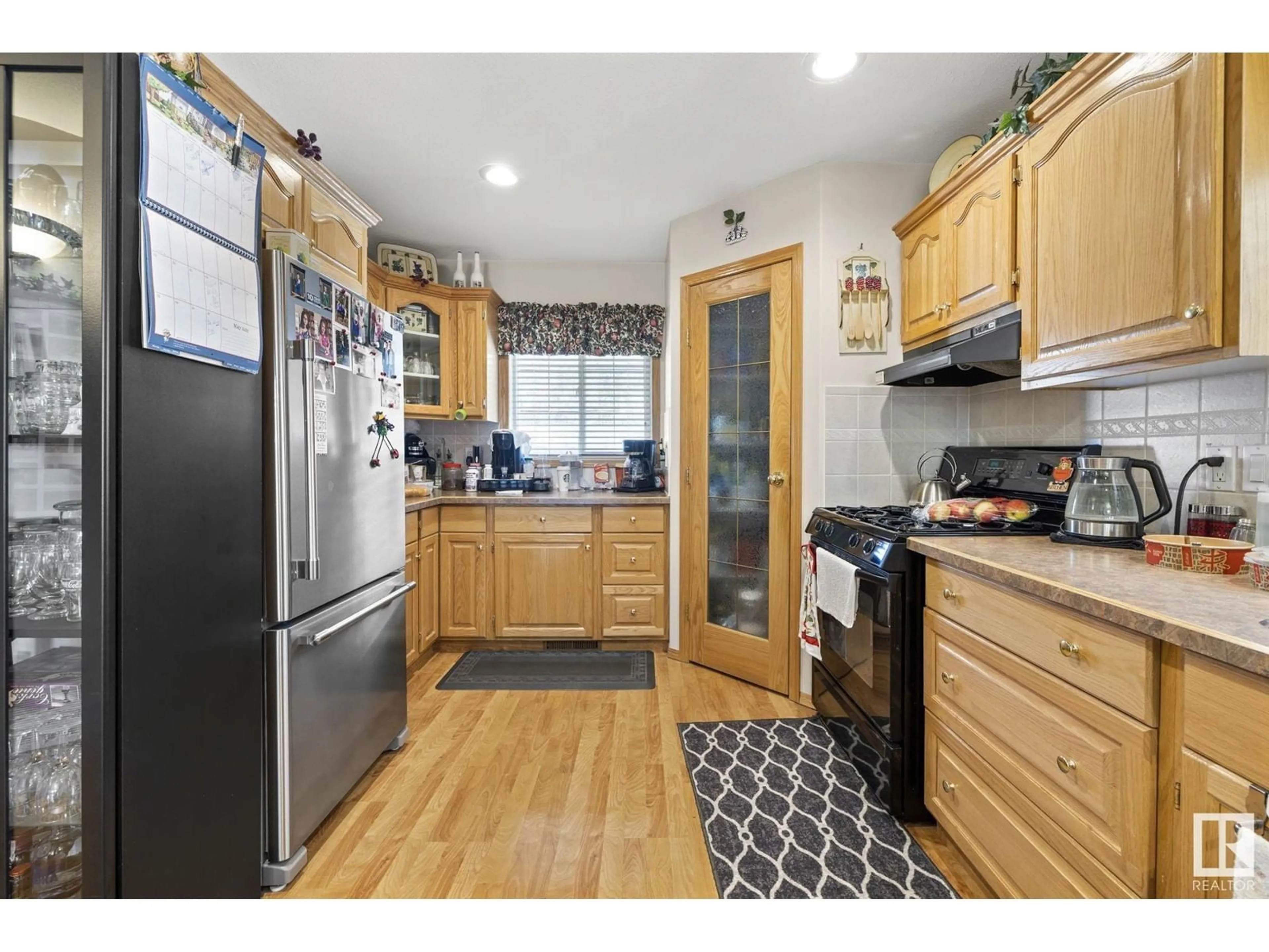 Standard kitchen, wood/laminate floor for 60201 - 226 RNG RD, Rural St. Paul County Alberta T0A0N0