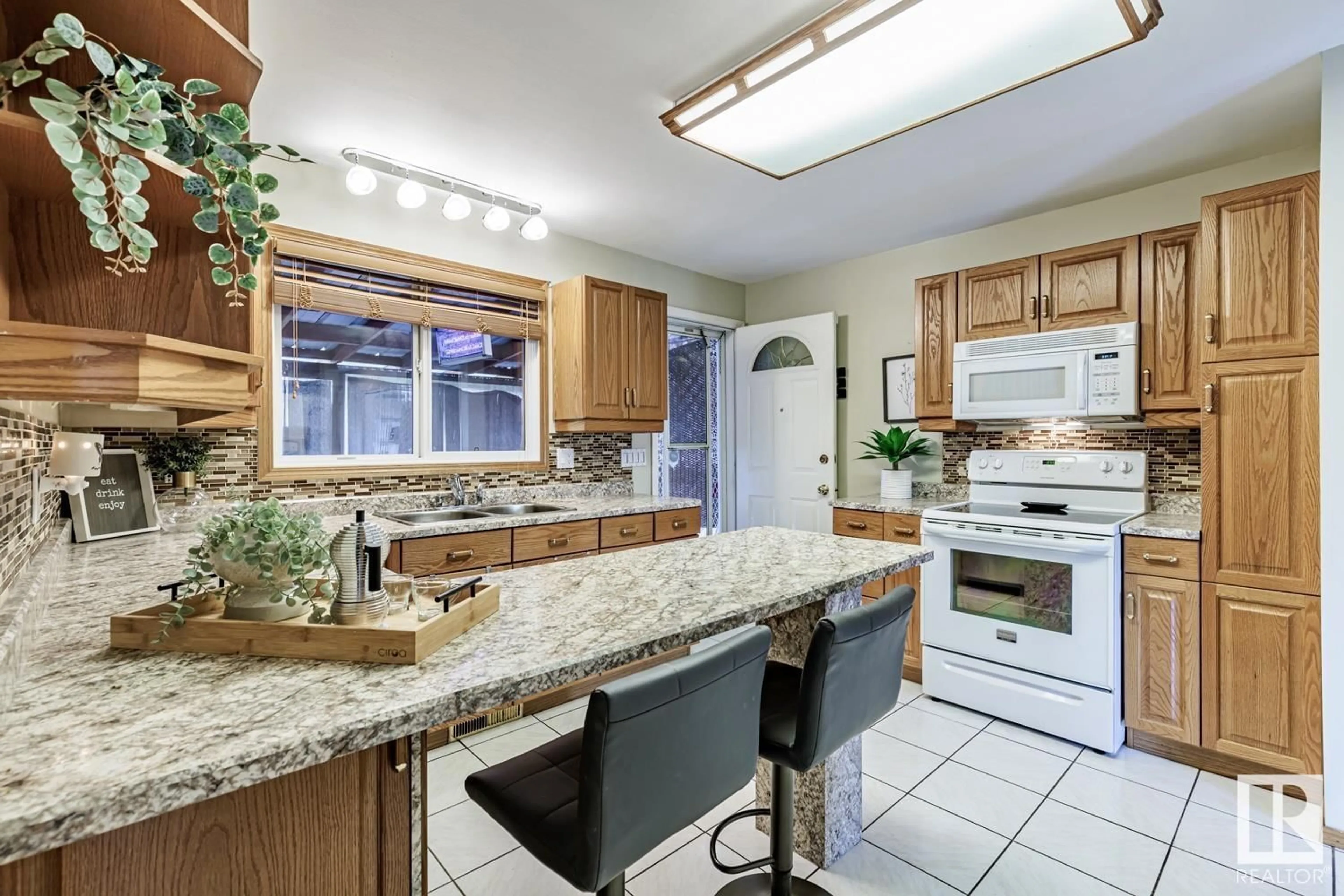 Open concept kitchen, ceramic/tile floor for 6723 40 AV NW, Edmonton Alberta T6K1R9