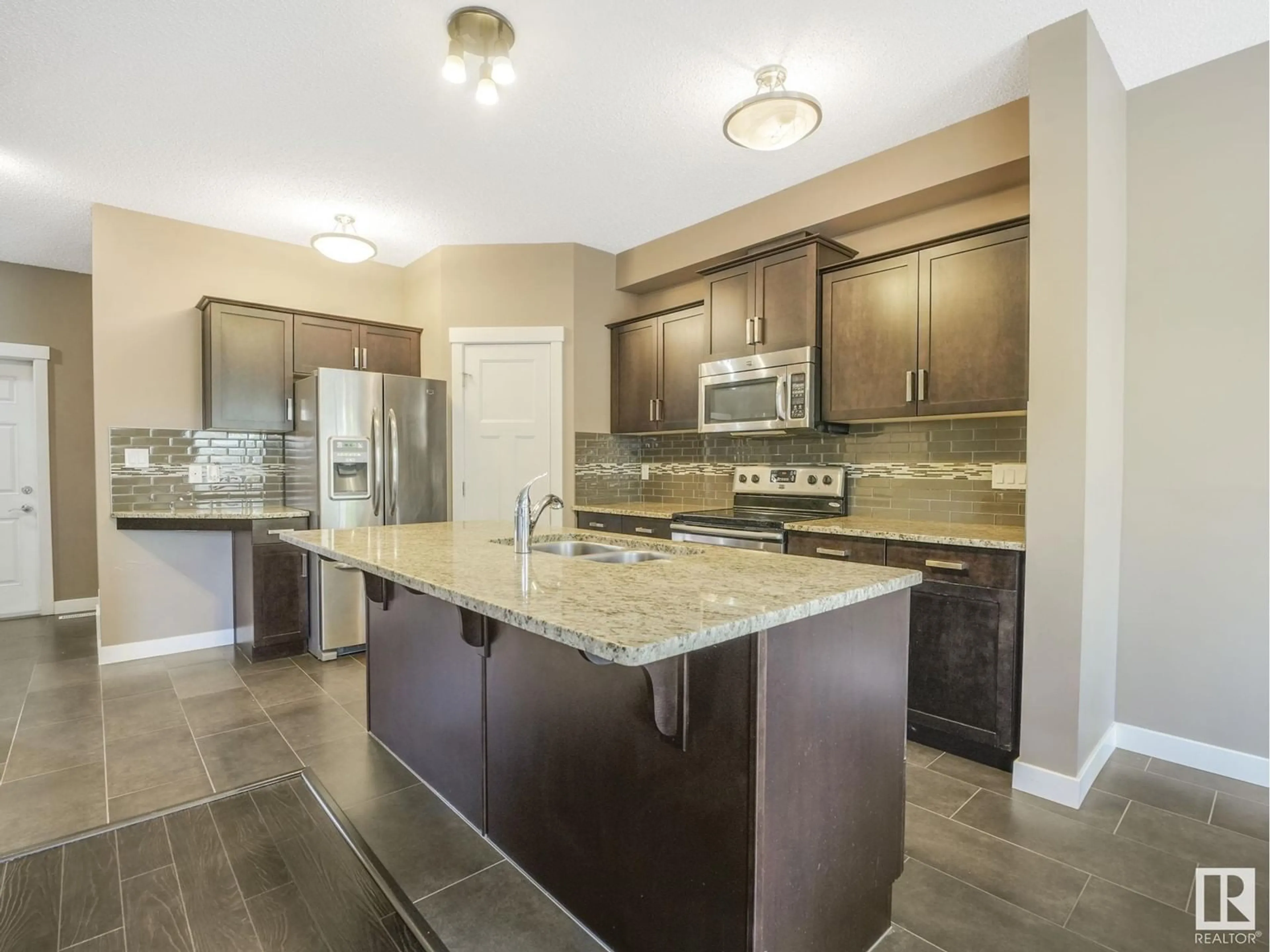 Open concept kitchen, ceramic/tile floor for #9 - 3103 HILTON DR, Edmonton Alberta T6M0R3
