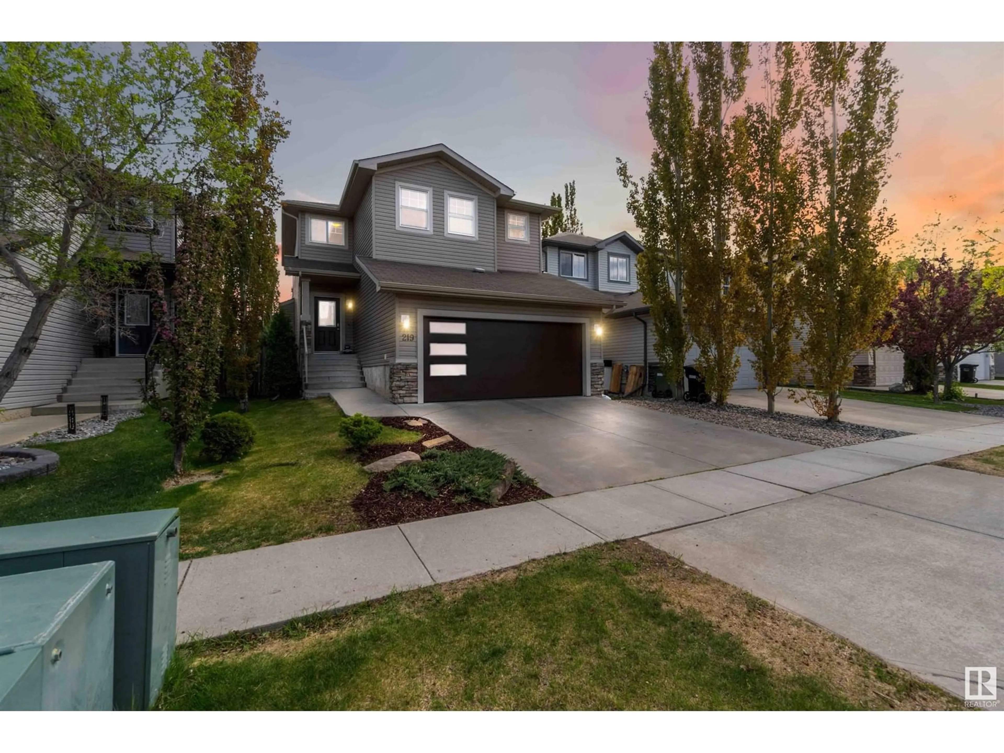 Home with vinyl exterior material, street for 219 AVENA CI, Leduc Alberta T9E0L8
