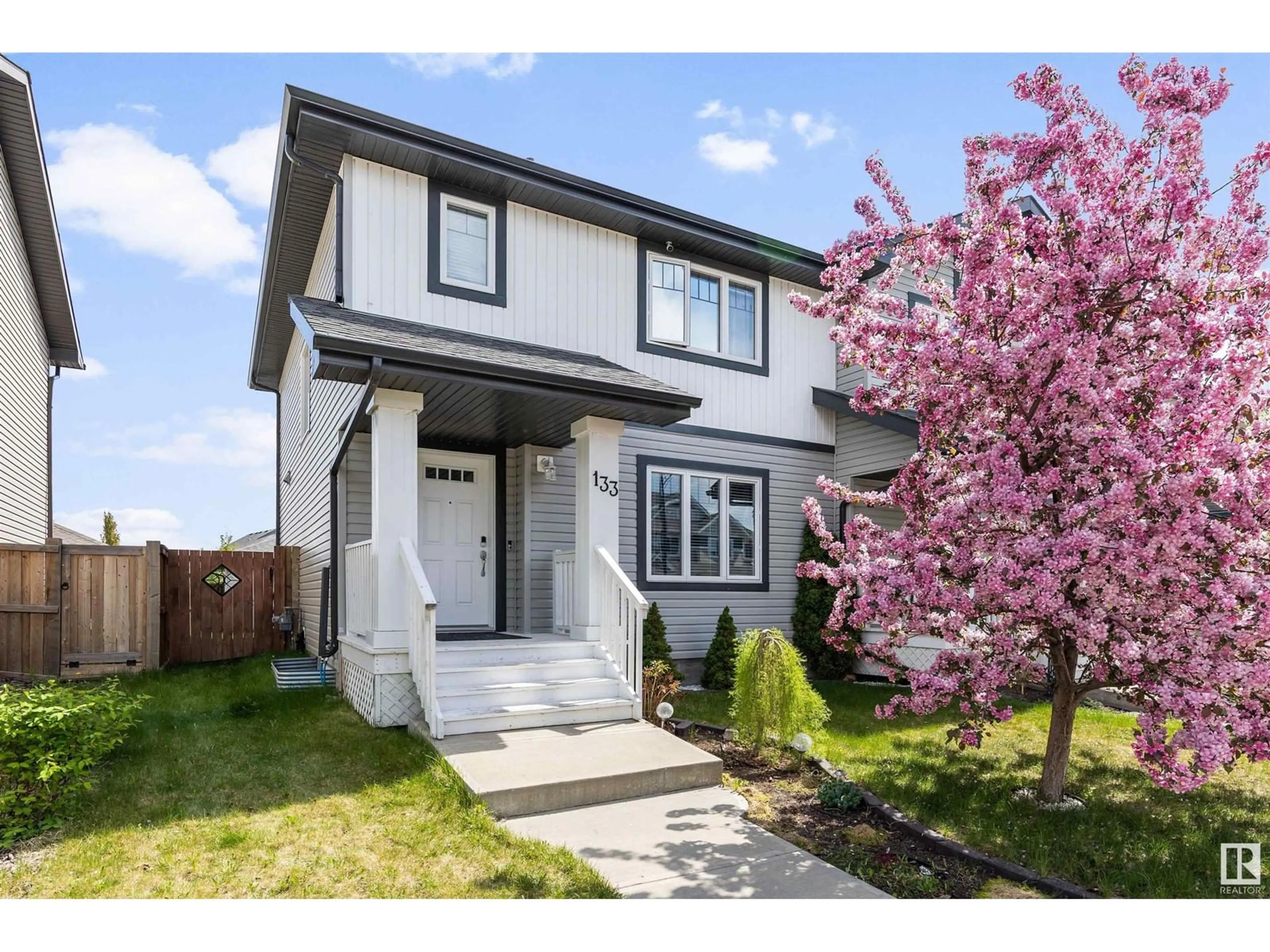 Home with vinyl exterior material, street for 133 CY BECKER BV, Edmonton Alberta T5Y0X8