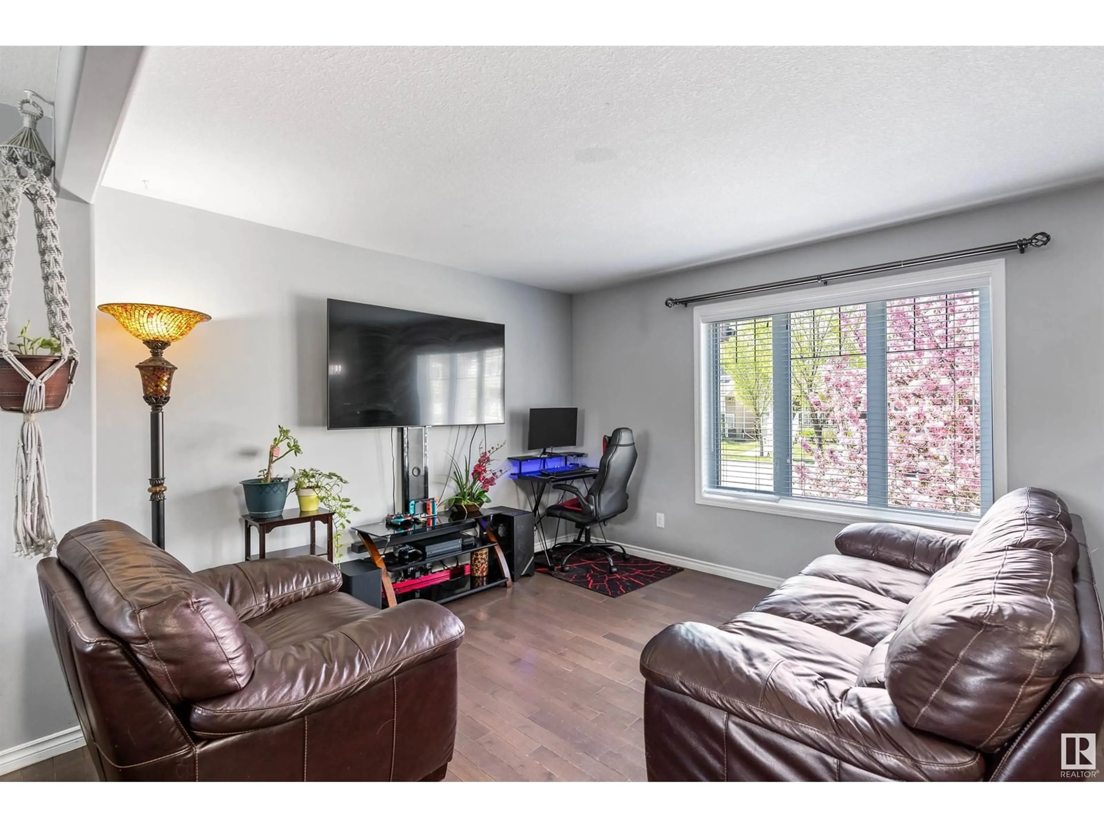 Living room with furniture, wood/laminate floor for 133 CY BECKER BV, Edmonton Alberta T5Y0X8