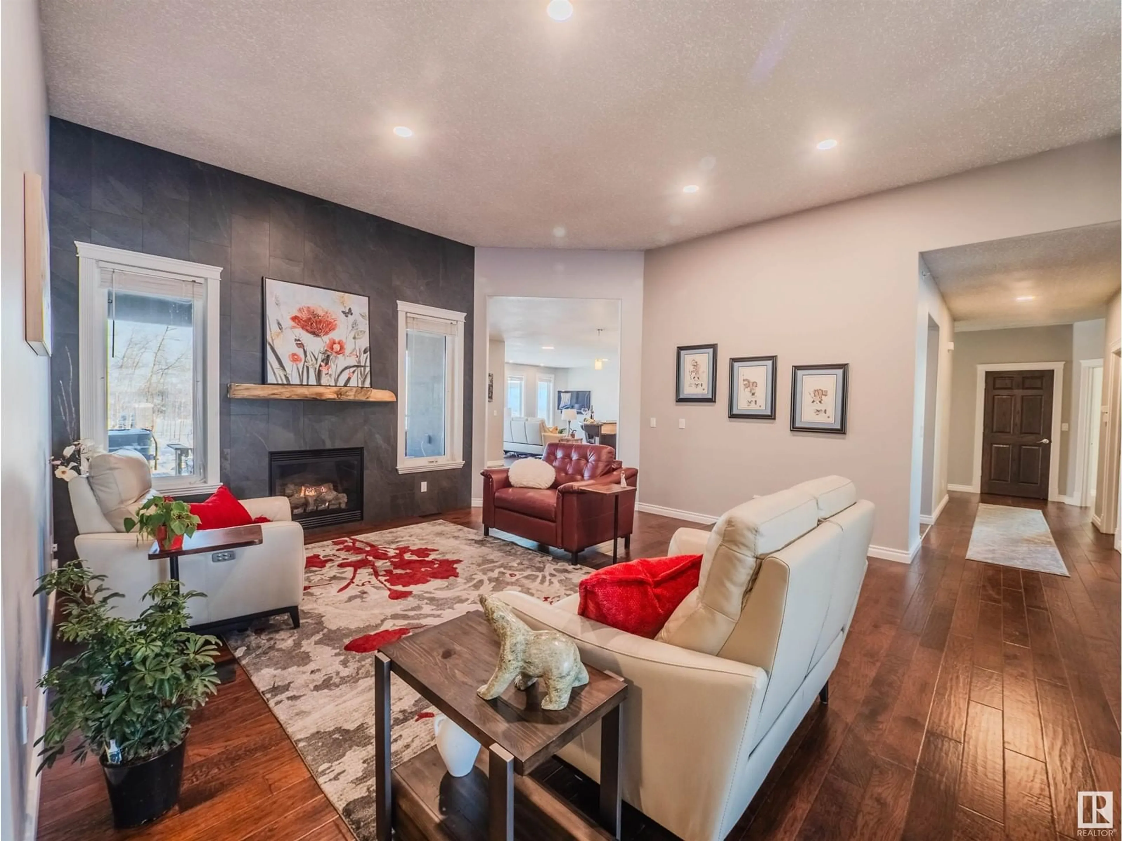 Living room with furniture, wood/laminate floor for 57 26323 TWP ROAD 532 A, Rural Parkland County Alberta T7X4M1