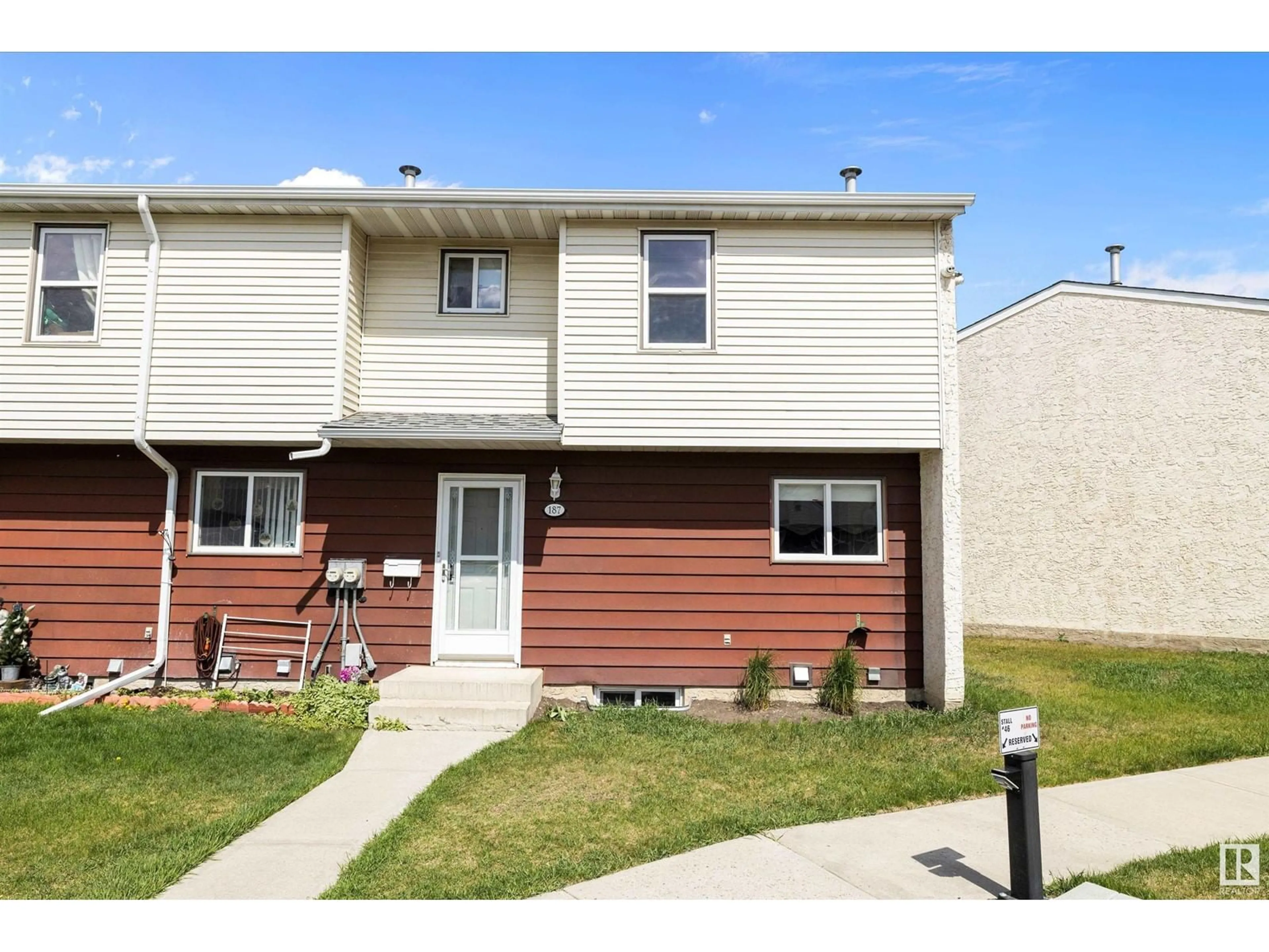 Home with vinyl exterior material, street for 187 HARRISON DR, Edmonton Alberta T5A2X5