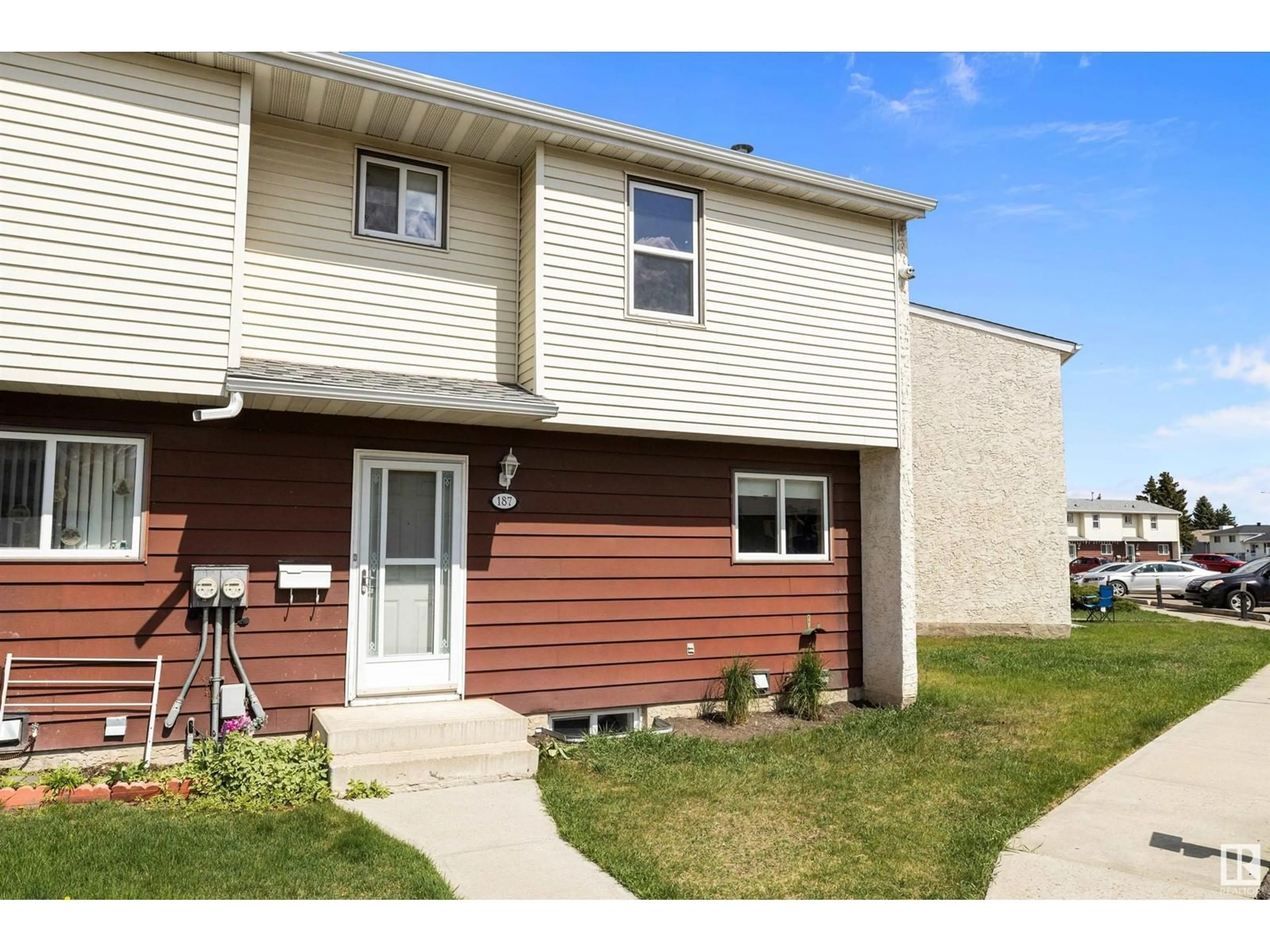 Home with vinyl exterior material, street for 187 HARRISON DR, Edmonton Alberta T5A2X5