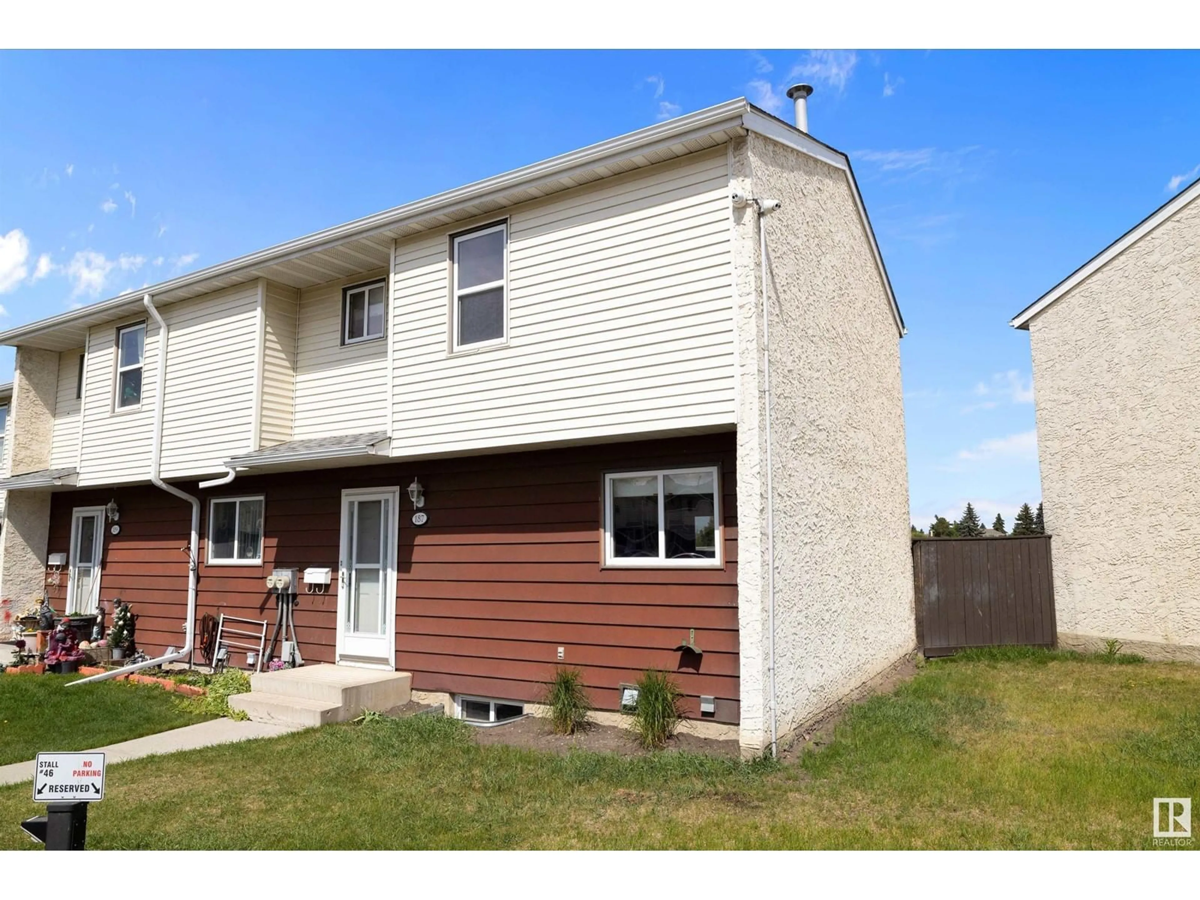 Home with vinyl exterior material, street for 187 HARRISON DR, Edmonton Alberta T5A2X5