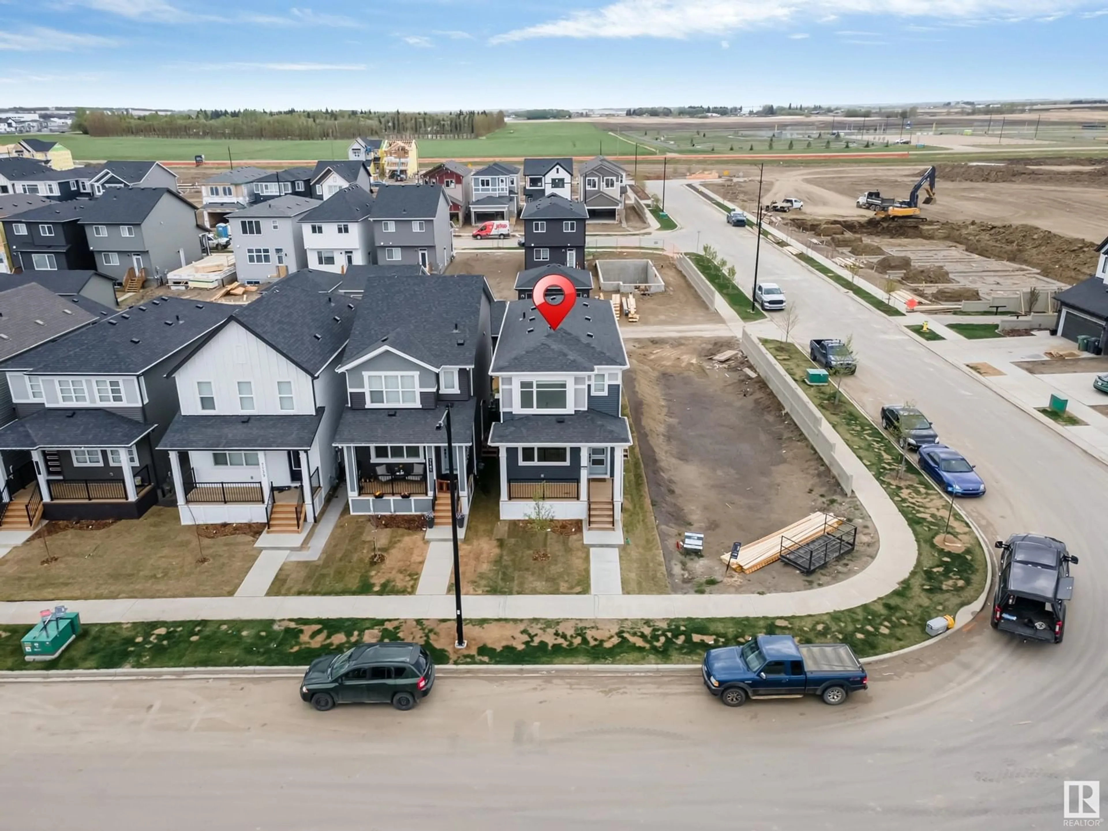 A pic from outside/outdoor area/front of a property/back of a property/a pic from drone, street for 7143 52 AV, Beaumont Alberta T4X2Z7
