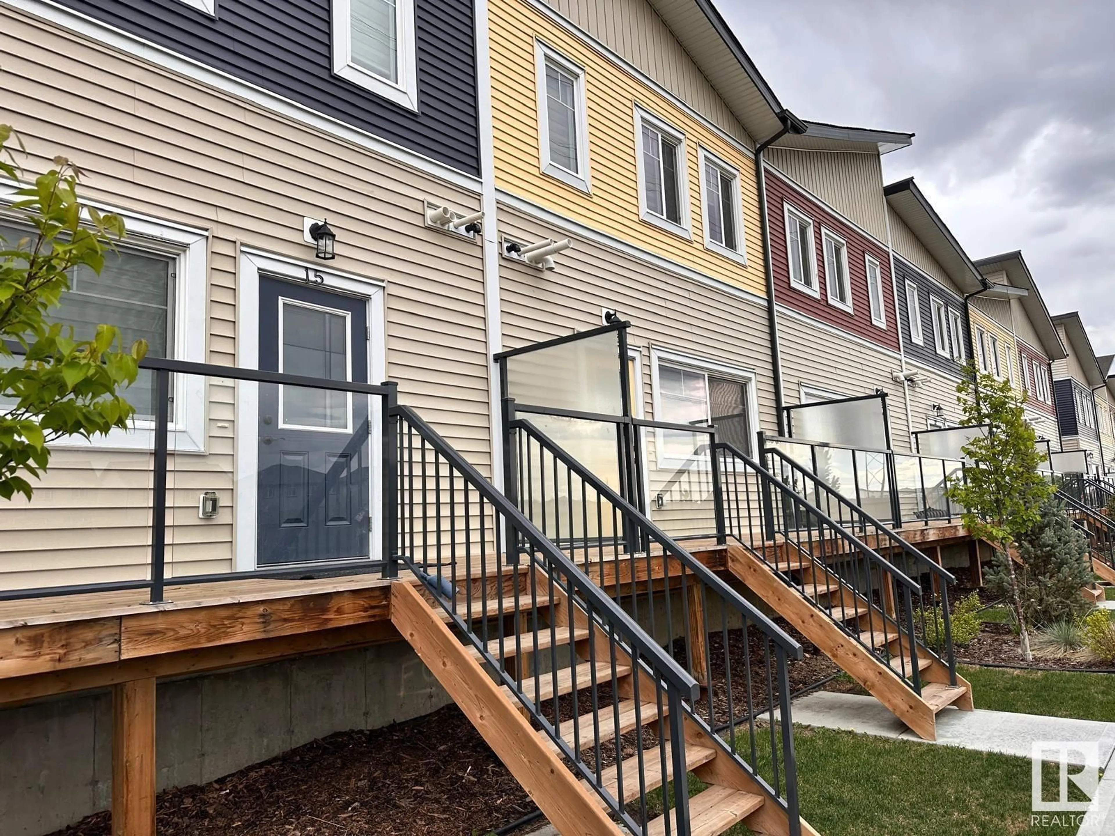 Home with vinyl exterior material, street for #15 - 2803 14 AV, Edmonton Alberta T6T1A8