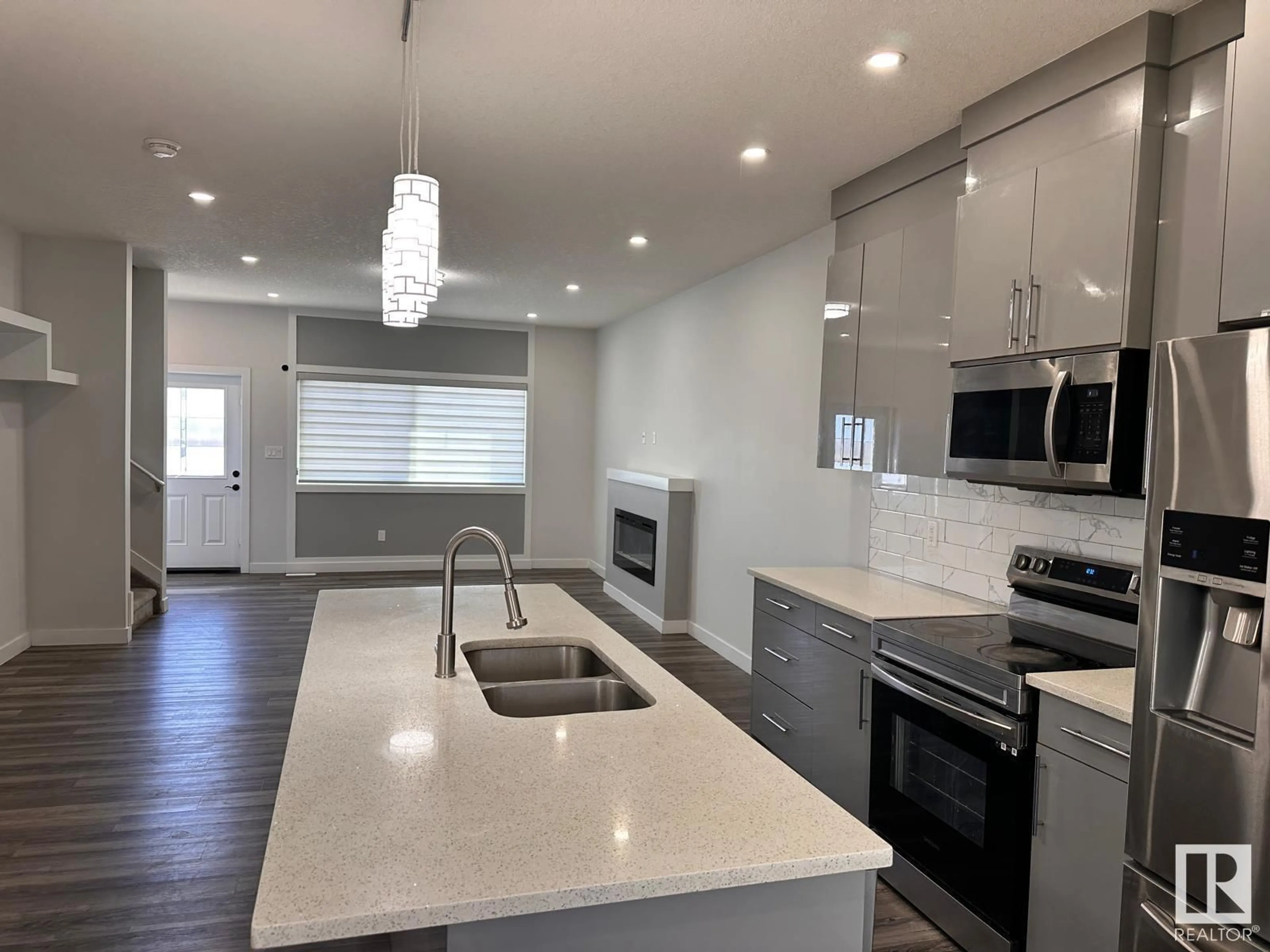 Open concept kitchen, unknown for #15 - 2803 14 AV, Edmonton Alberta T6T1A8