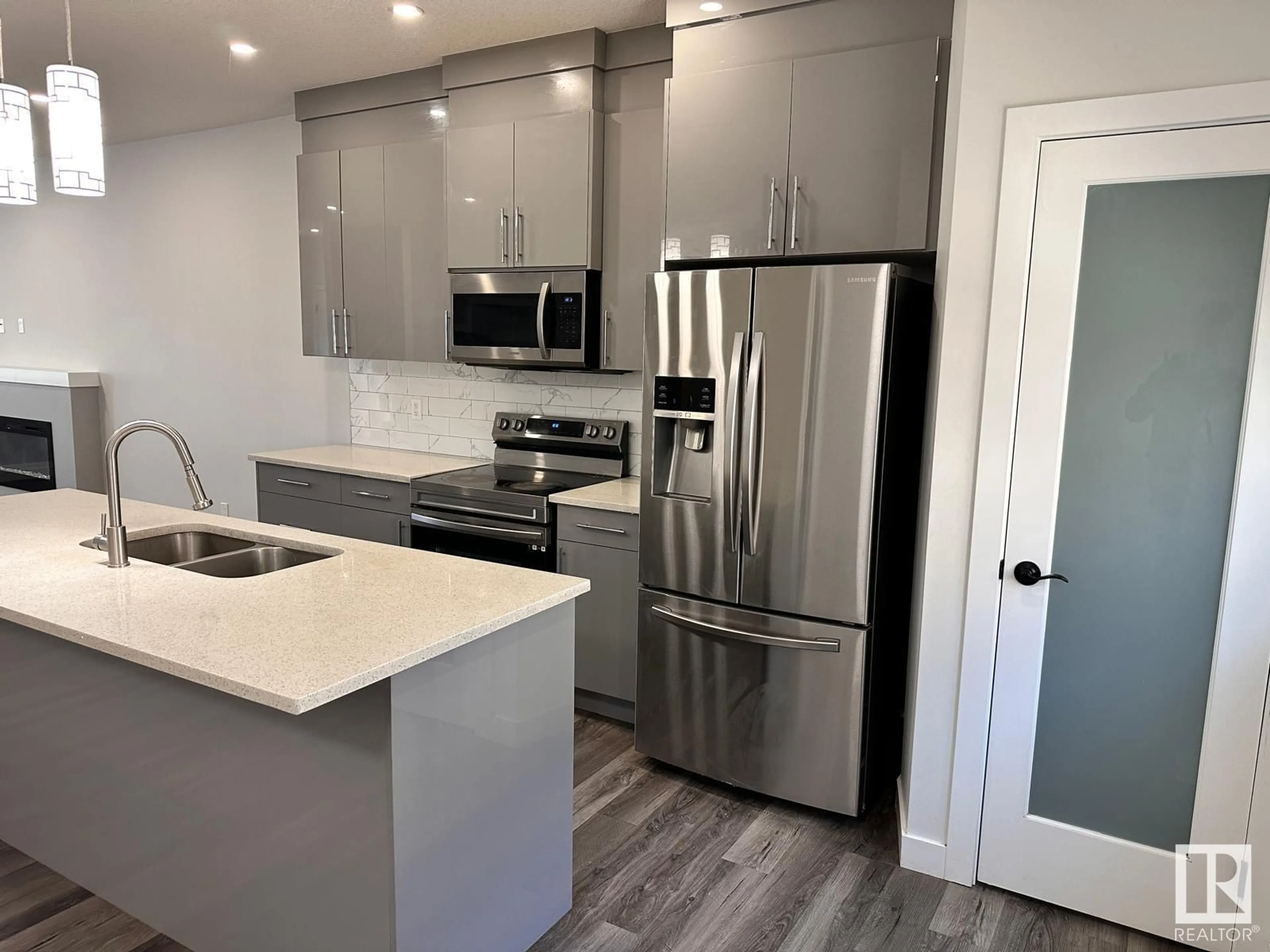 Open concept kitchen, unknown for #15 - 2803 14 AV, Edmonton Alberta T6T1A8