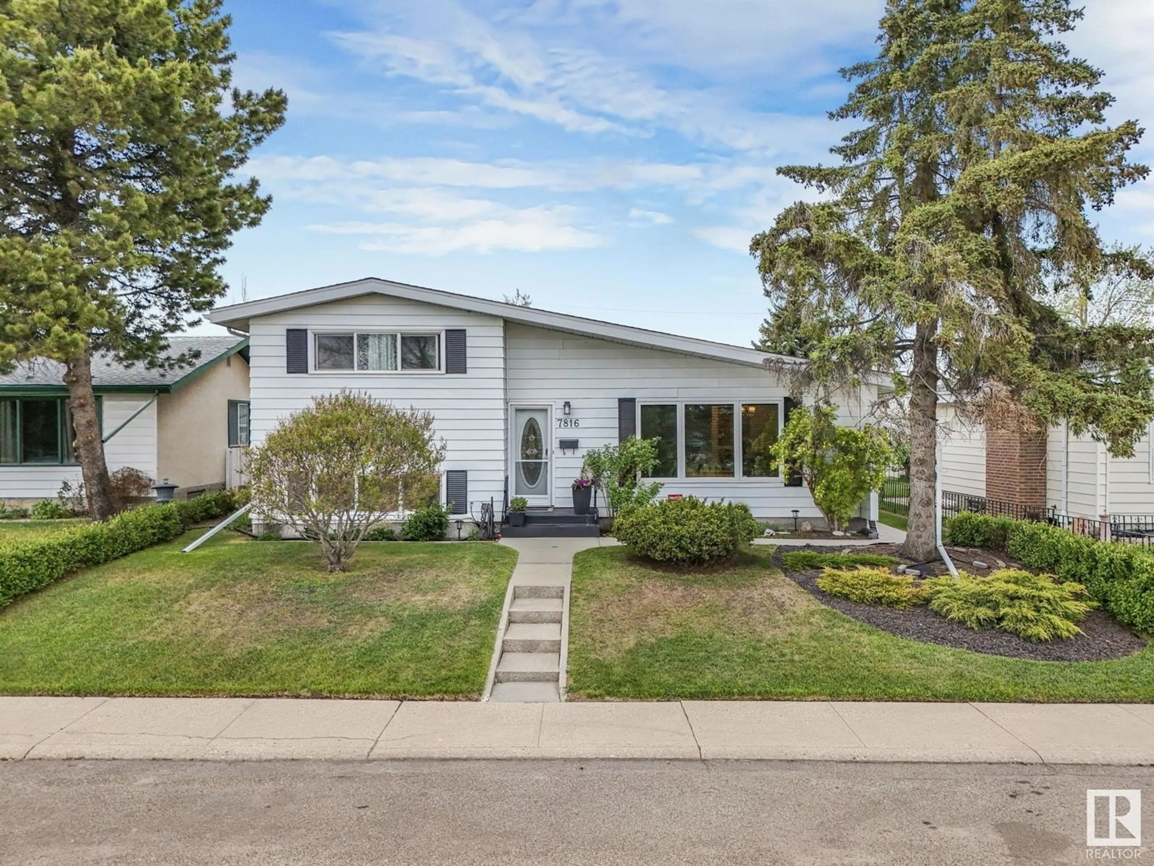 Home with vinyl exterior material, street for 7816 135A AV, Edmonton Alberta T5C2J5
