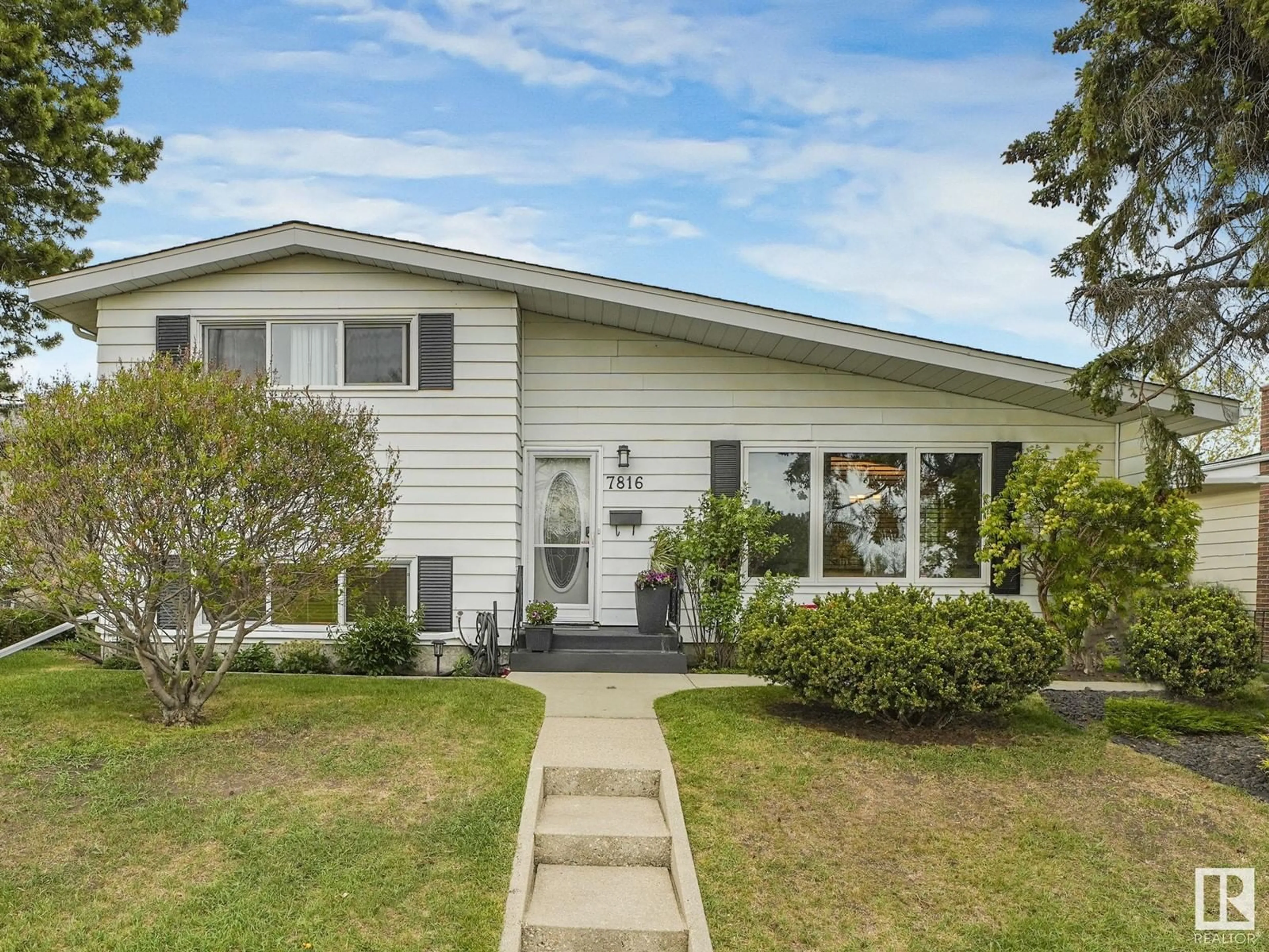 Home with vinyl exterior material, street for 7816 135A AV, Edmonton Alberta T5C2J5
