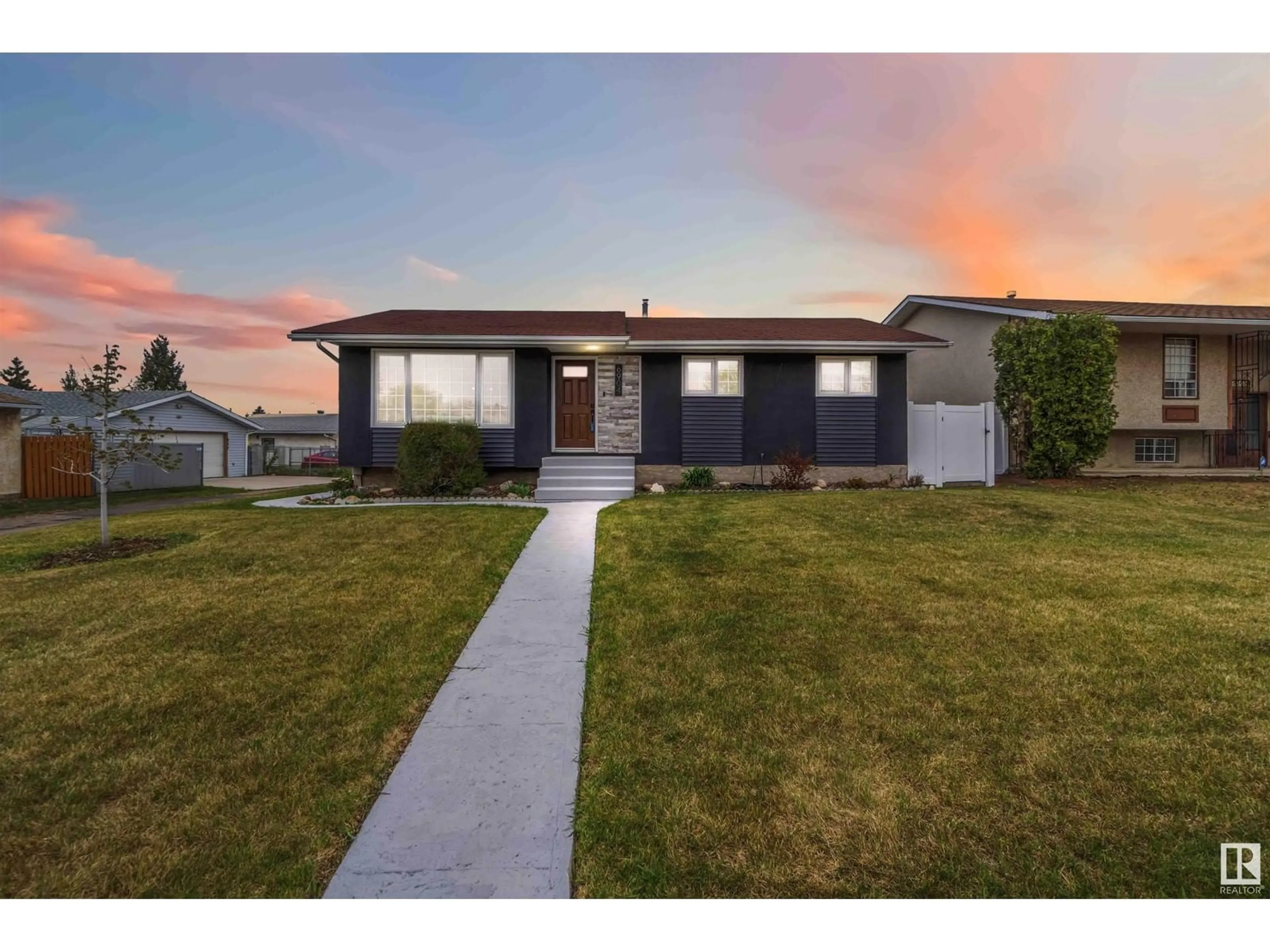 Home with vinyl exterior material, street for 6904 39 AV, Edmonton Alberta T6K1T8