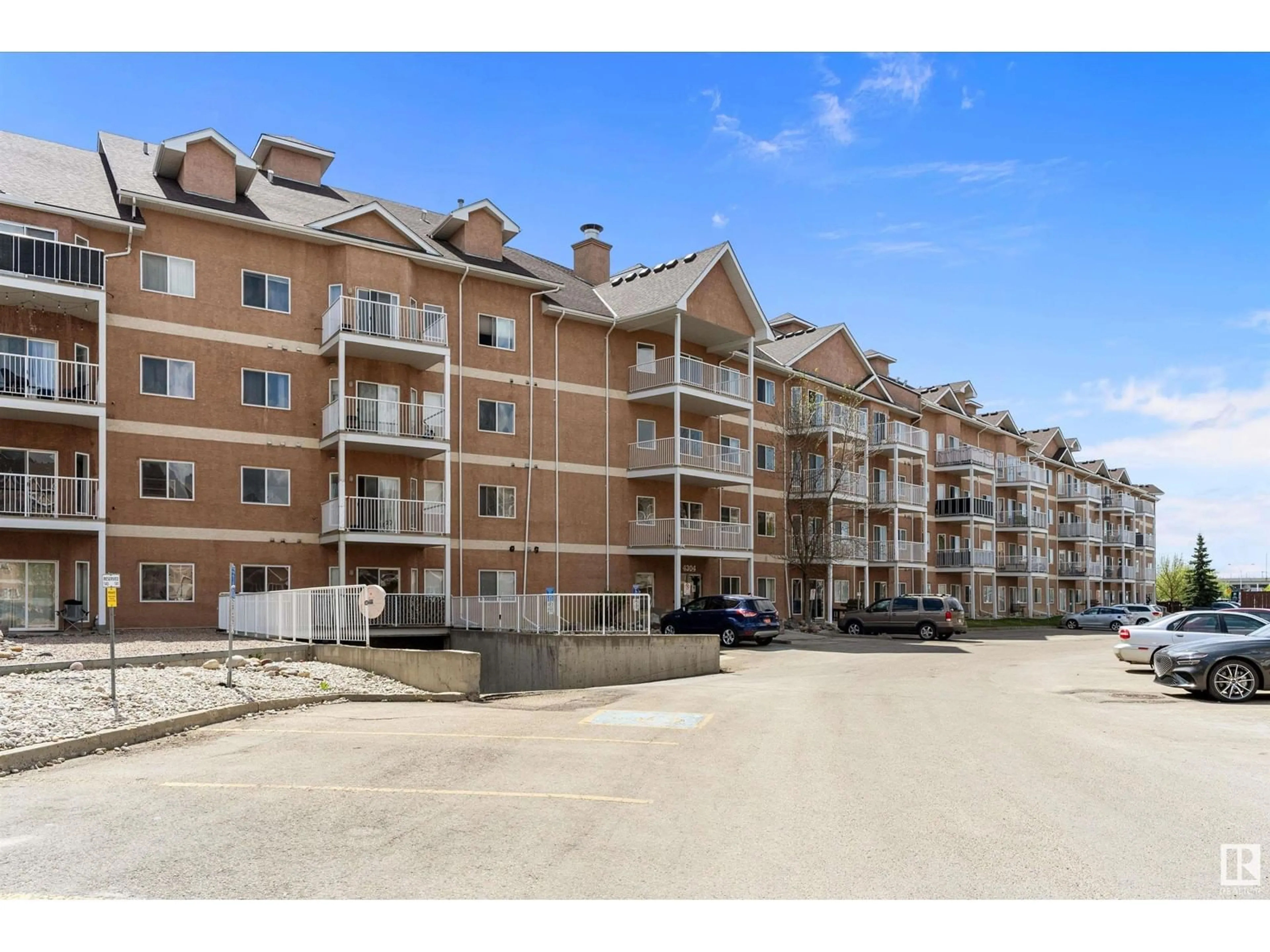 A pic from outside/outdoor area/front of a property/back of a property/a pic from drone, water/lake/river/ocean view for #209 - 4304 139 AV, Edmonton Alberta T5Y0H6