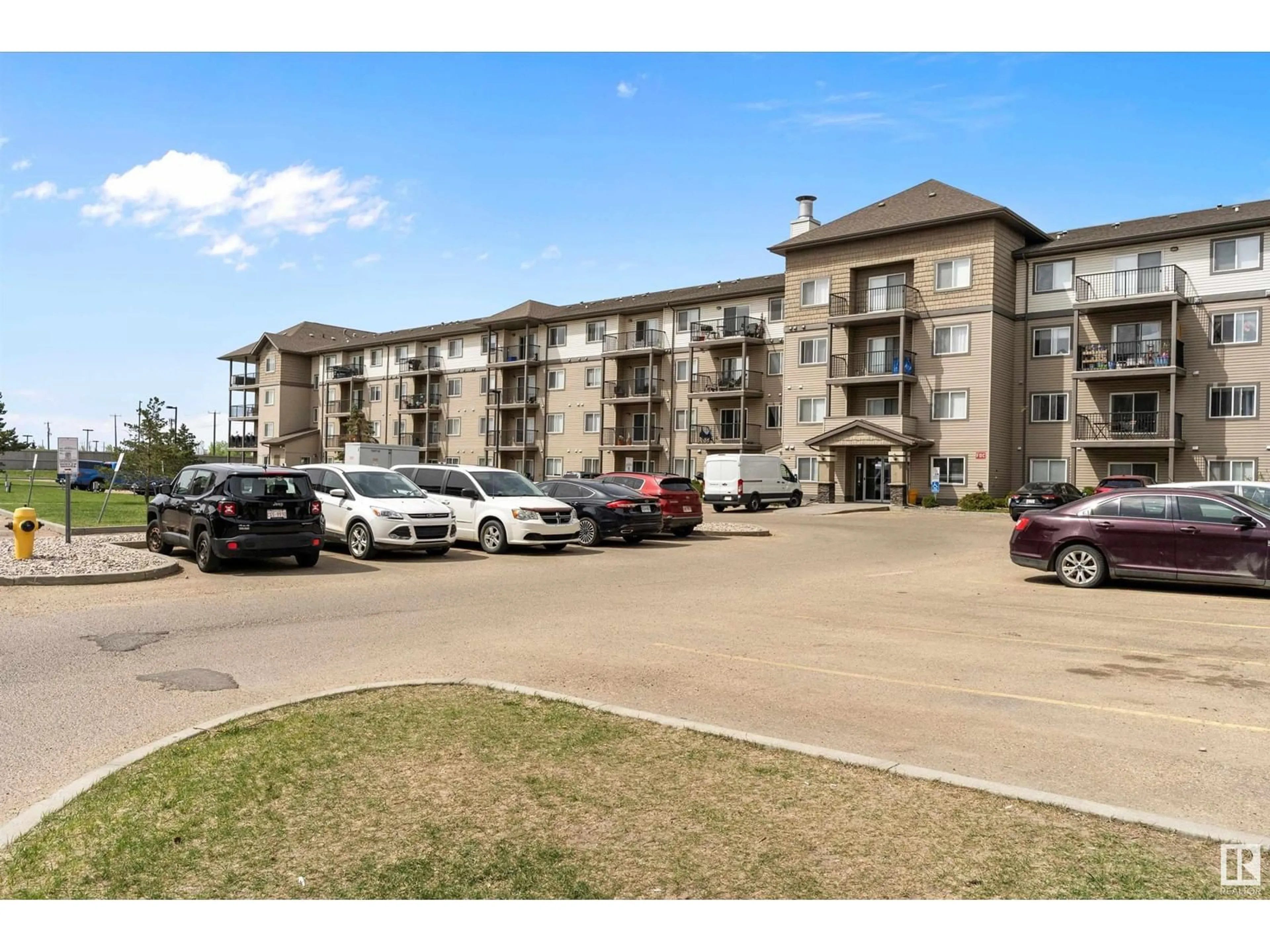 A pic from outside/outdoor area/front of a property/back of a property/a pic from drone, unknown for 301 - 335 CLAREVIEW STATTION DR, Edmonton Alberta T5Y0J4
