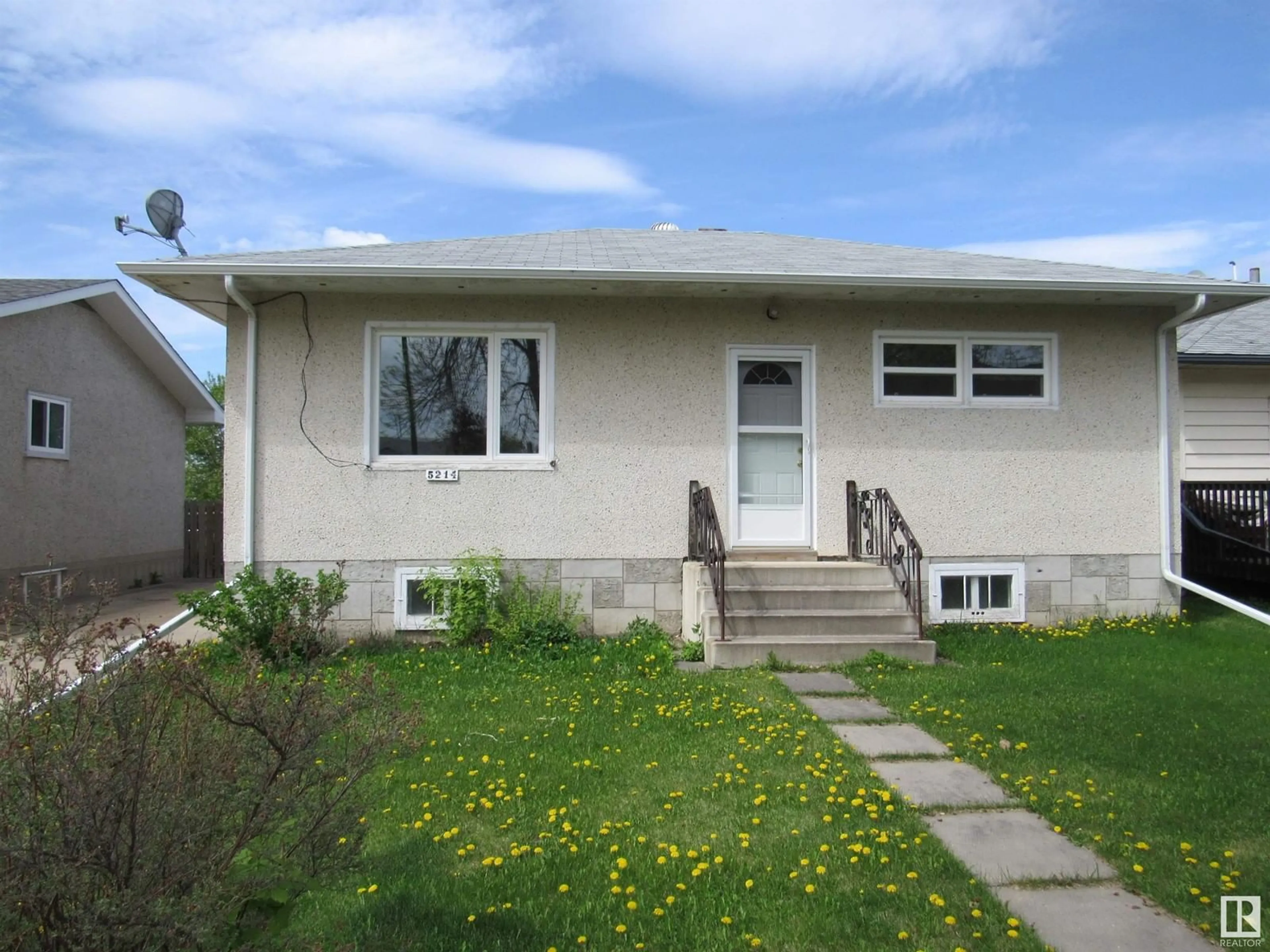 Home with vinyl exterior material, street for 5214 47 STREET, Barrhead Alberta T7N1N3
