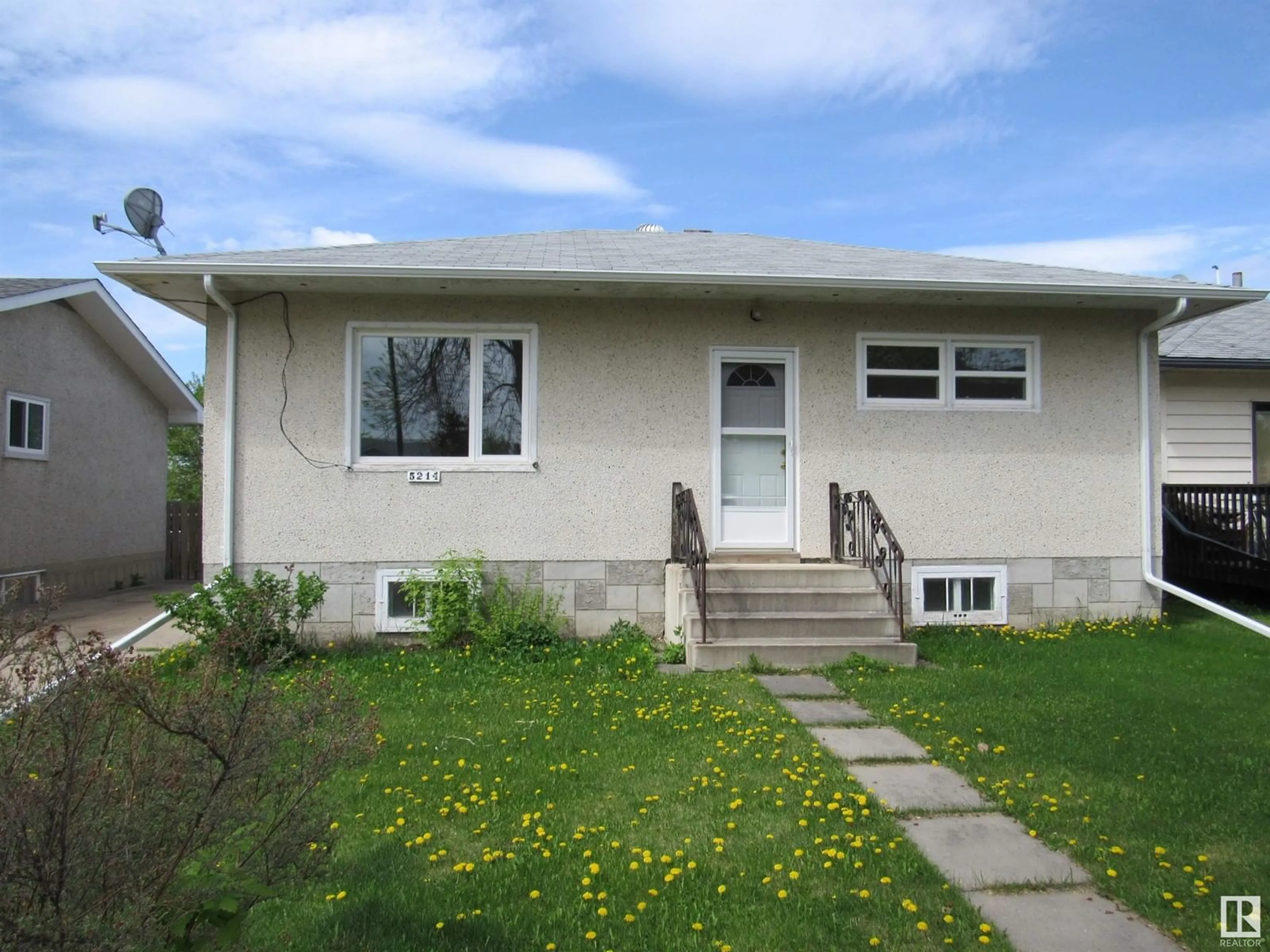 Home with vinyl exterior material, street for 5214 47 STREET, Barrhead Alberta T7N1N3