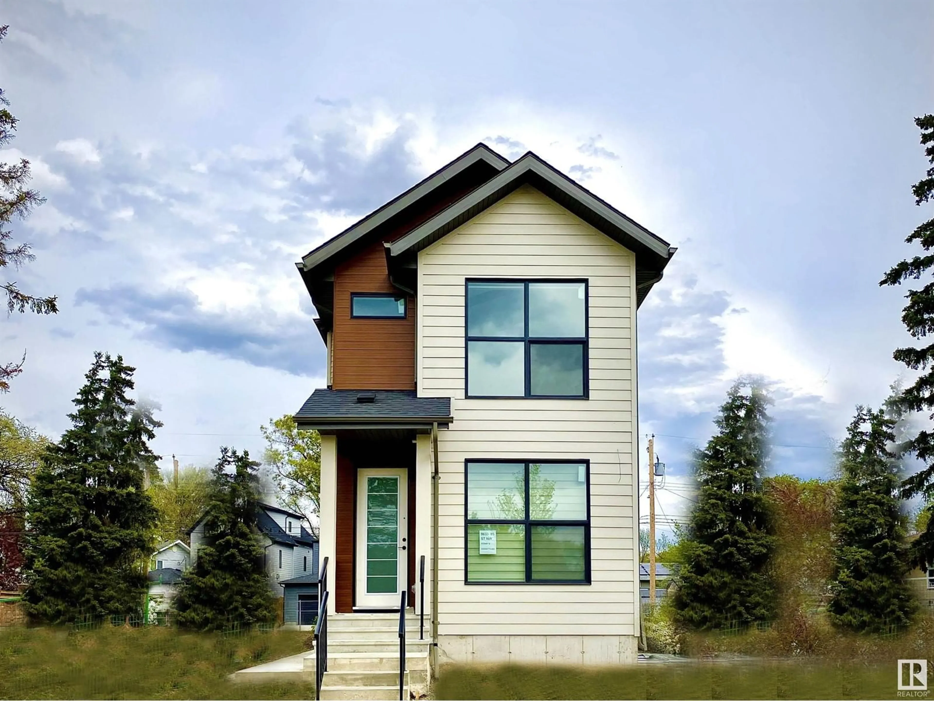 Home with vinyl exterior material, street for 9633 85 ST, Edmonton Alberta T6C3E3