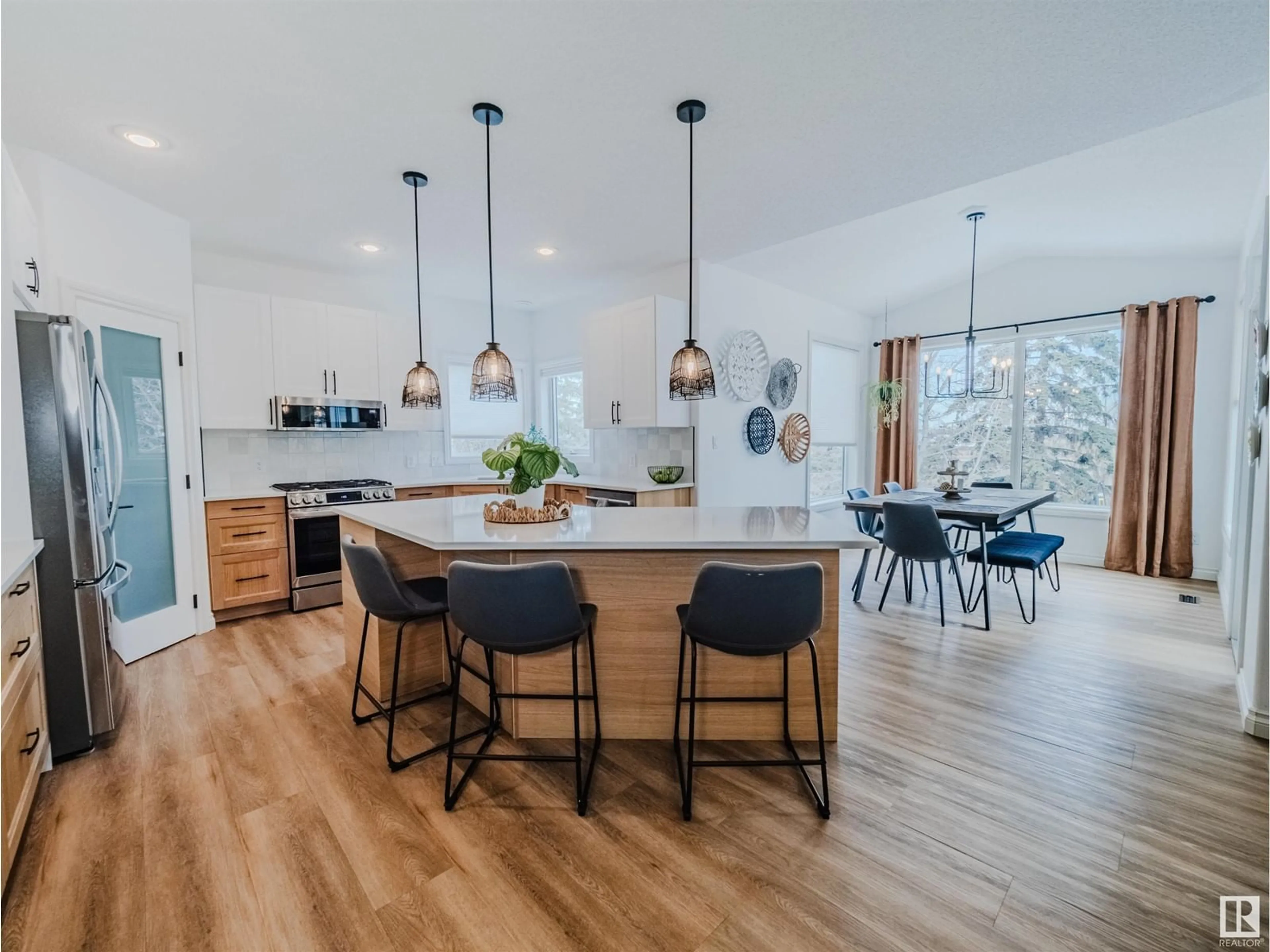 Open concept kitchen, wood/laminate floor for 54 LINKSVIEW DR, Spruce Grove Alberta T7X4P3