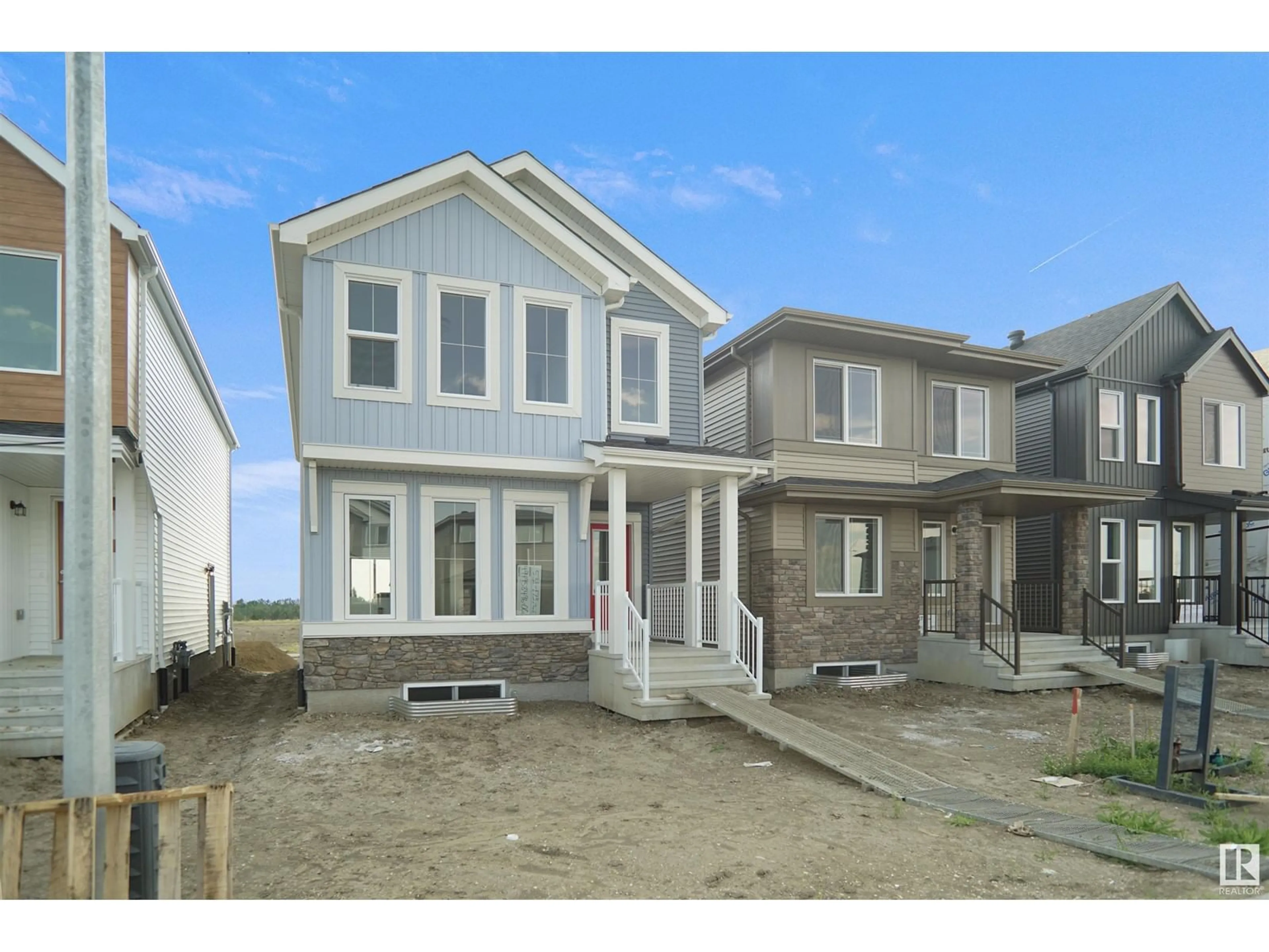 Home with vinyl exterior material, street for 1214 KESWICK DR, Edmonton Alberta T6W4J9