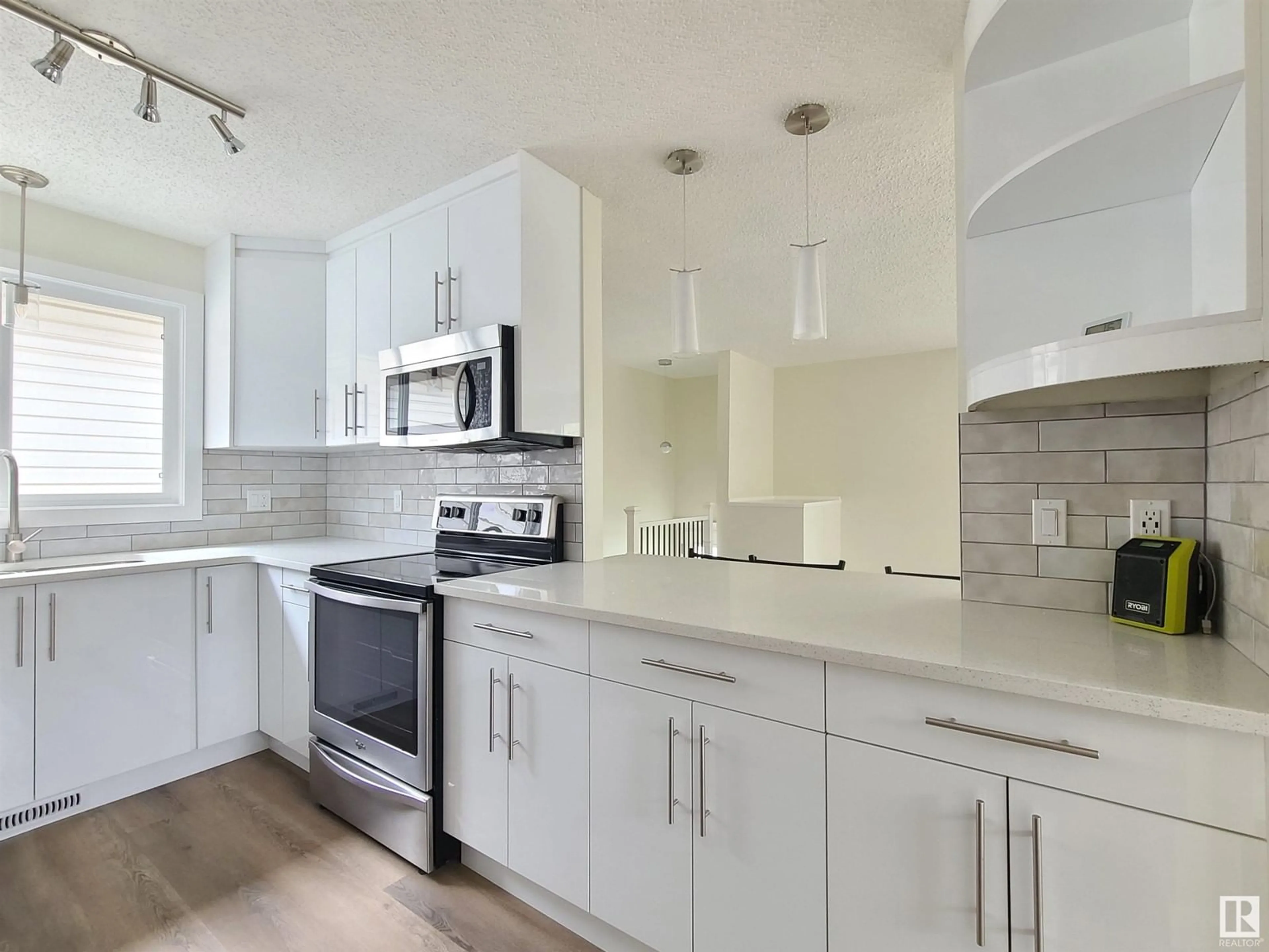 Open concept kitchen, ceramic/tile floor for NW - 12011 95A ST, Edmonton Alberta T5G1R6