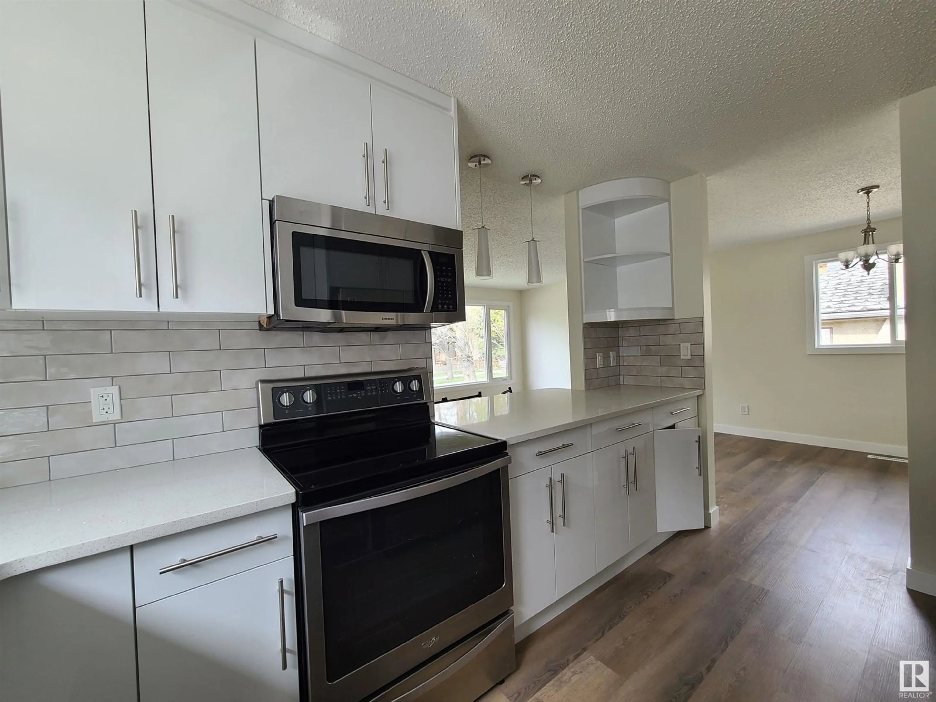 Open concept kitchen, unknown for NW - 12011 95A ST, Edmonton Alberta T5G1R6
