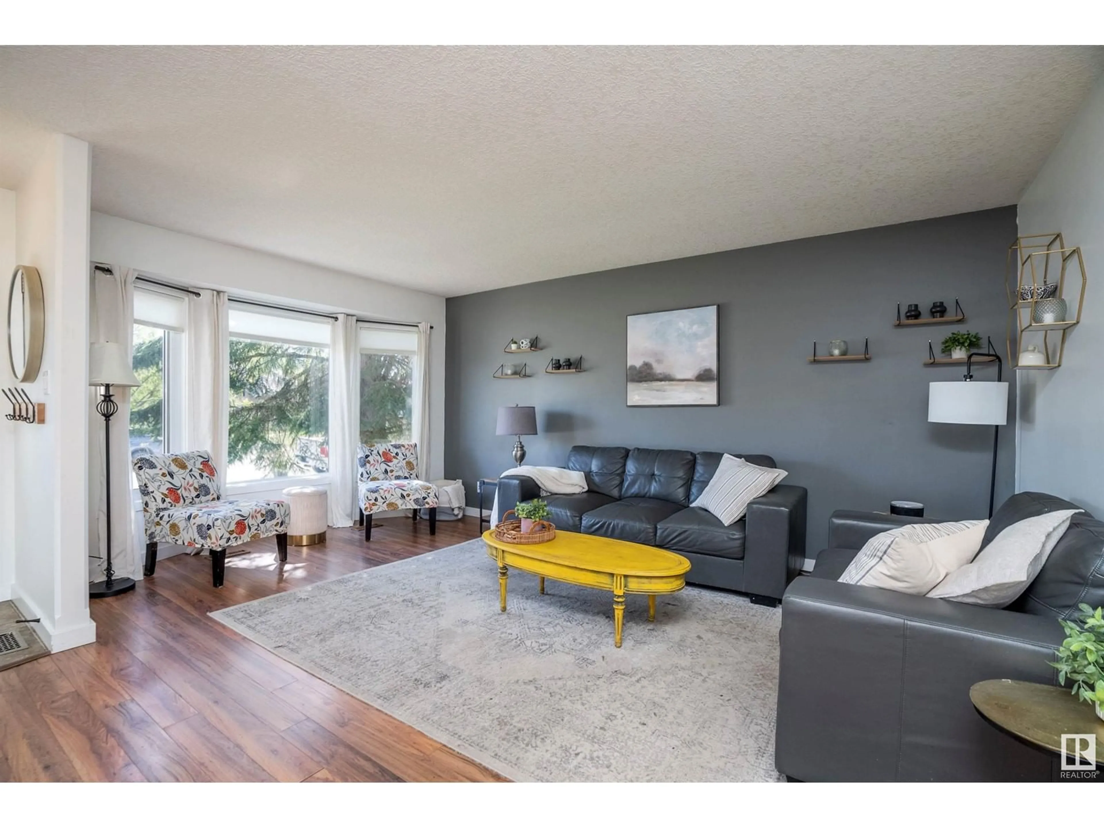 Living room with furniture, wood/laminate floor for 3222 41 ST, Leduc Alberta T9E6B9