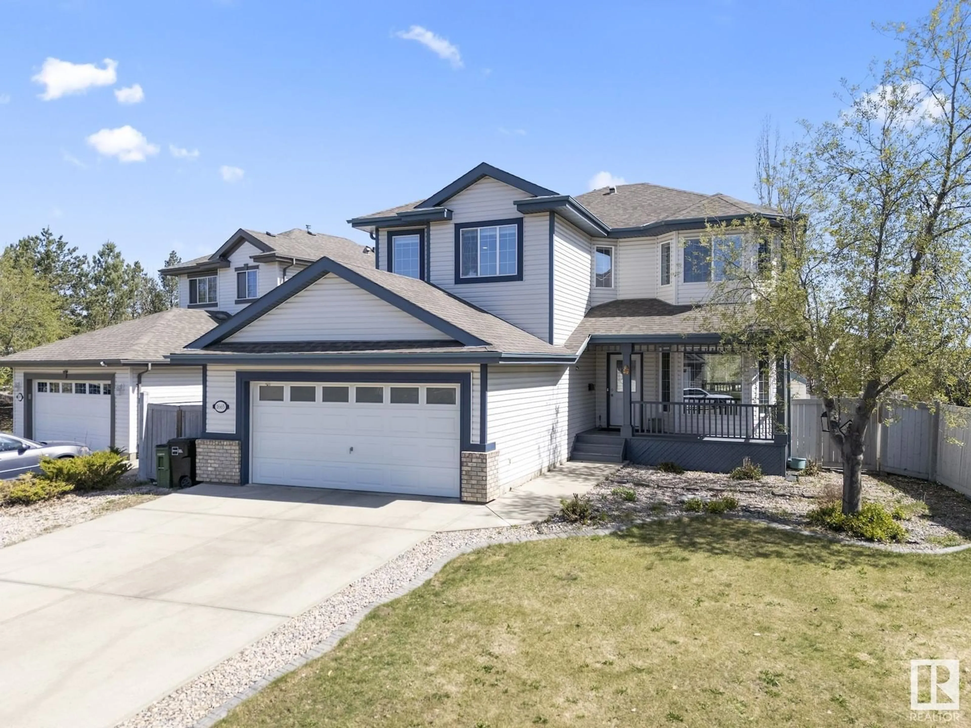 Home with vinyl exterior material, street for 1665 GLASTONBURY BV, Edmonton Alberta T5T6P3