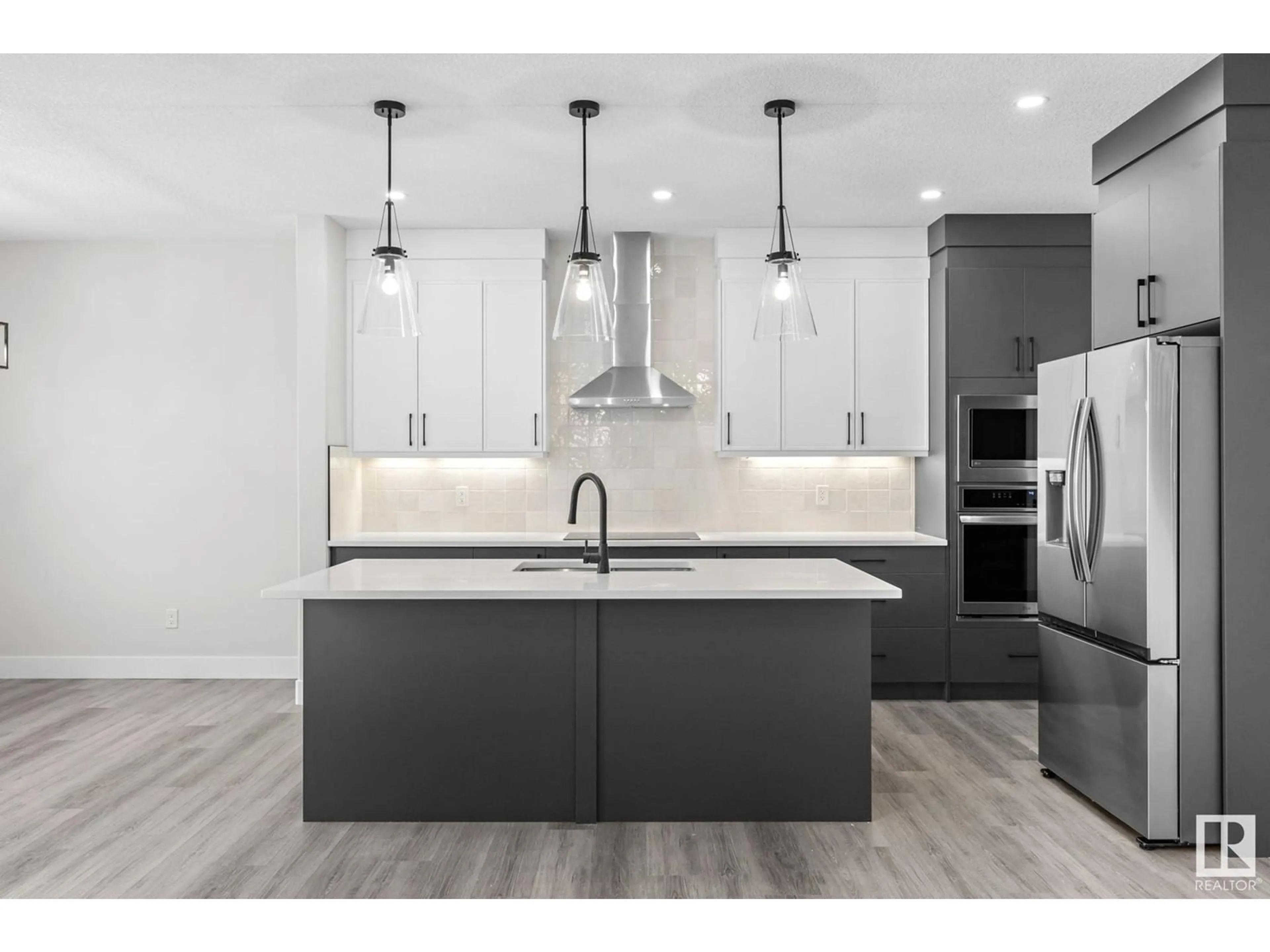 Open concept kitchen, unknown for 8512 181 AV, Edmonton Alberta T6X0R7