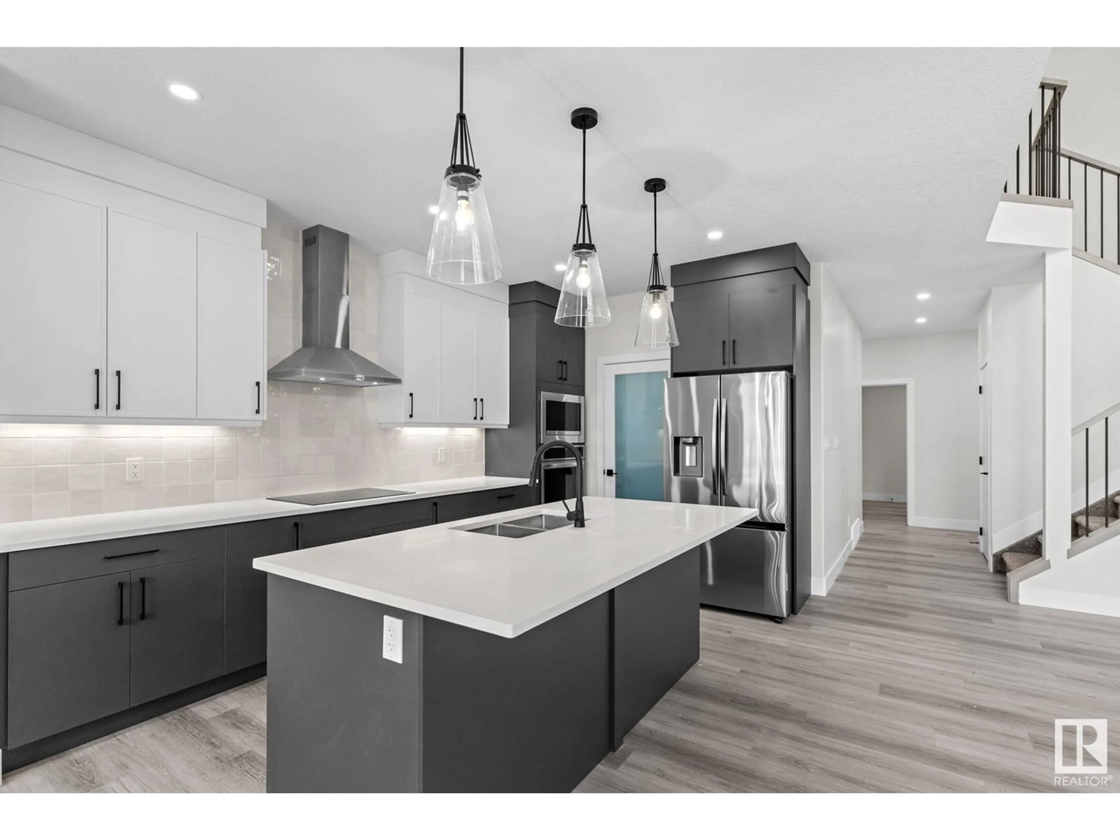Open concept kitchen, unknown for 8512 181 AV, Edmonton Alberta T6X0R7