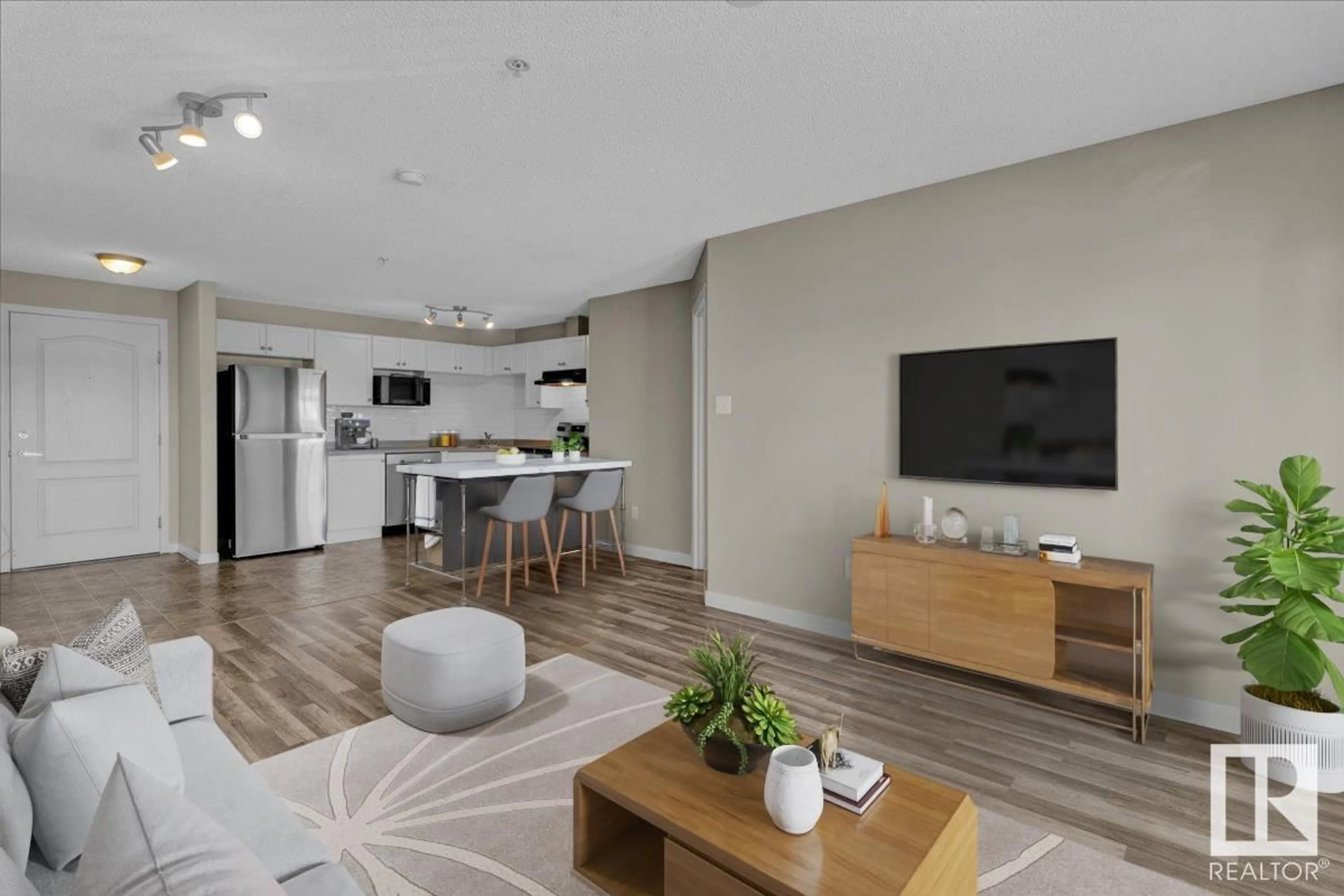 Living room with furniture, wood/laminate floor for #9363 - 1211 SIMPSON DR, Edmonton Alberta T6R0N2