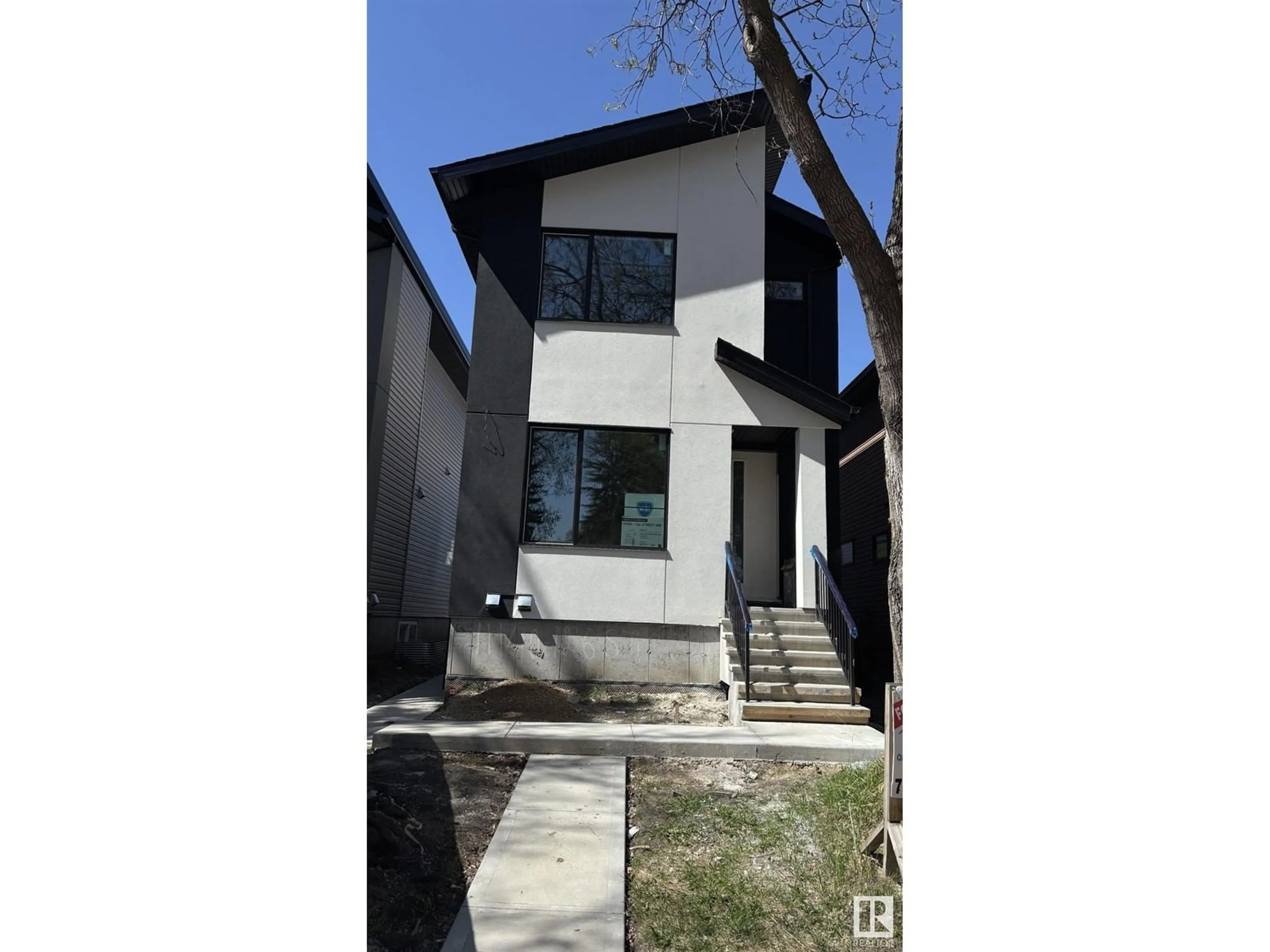 Home with brick exterior material, street for NW - 11140 126 ST E, Edmonton Alberta T5M0P9