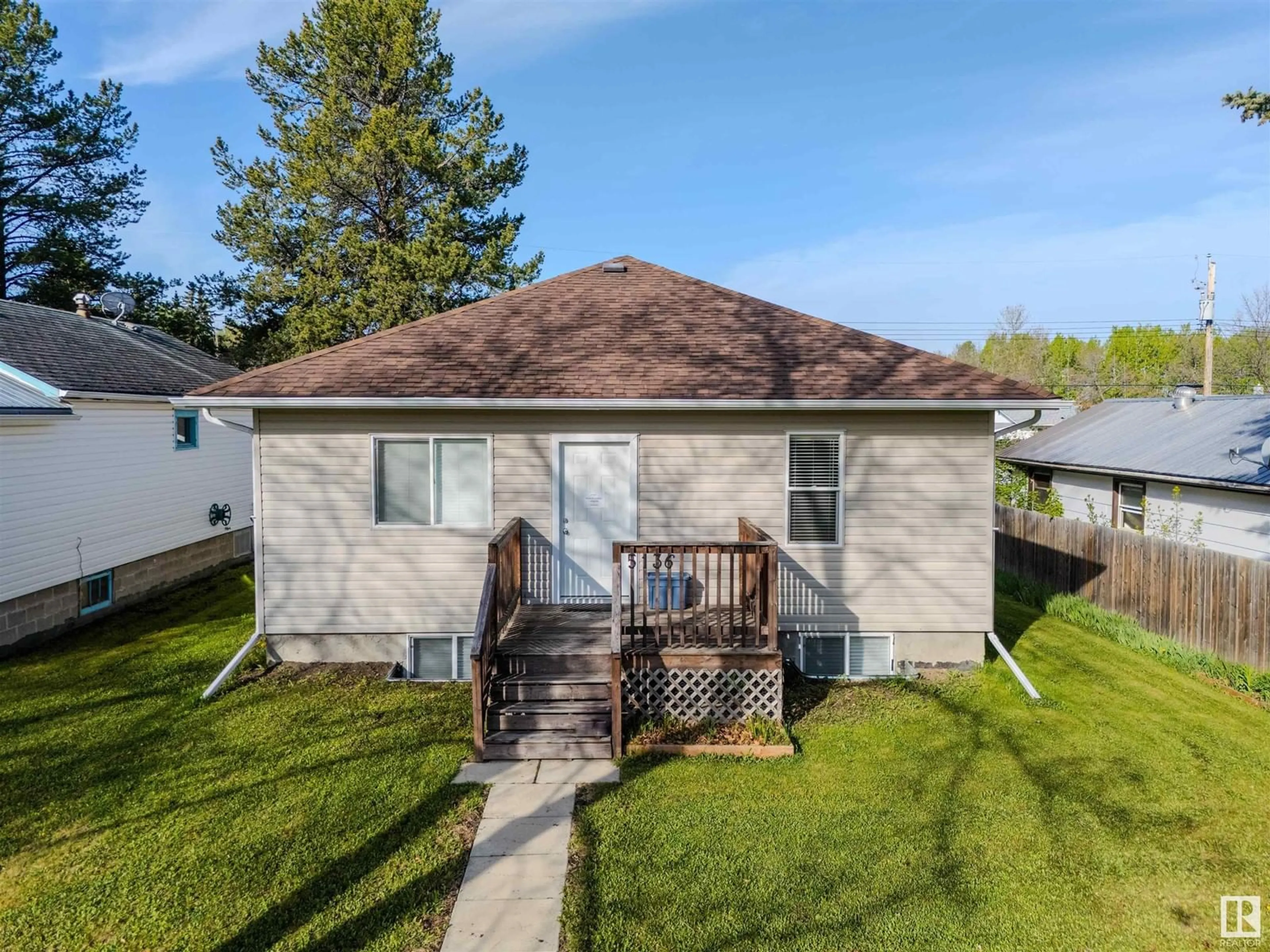 Home with vinyl exterior material, street for 5136 52 ST, Warburg Alberta T0C2T0