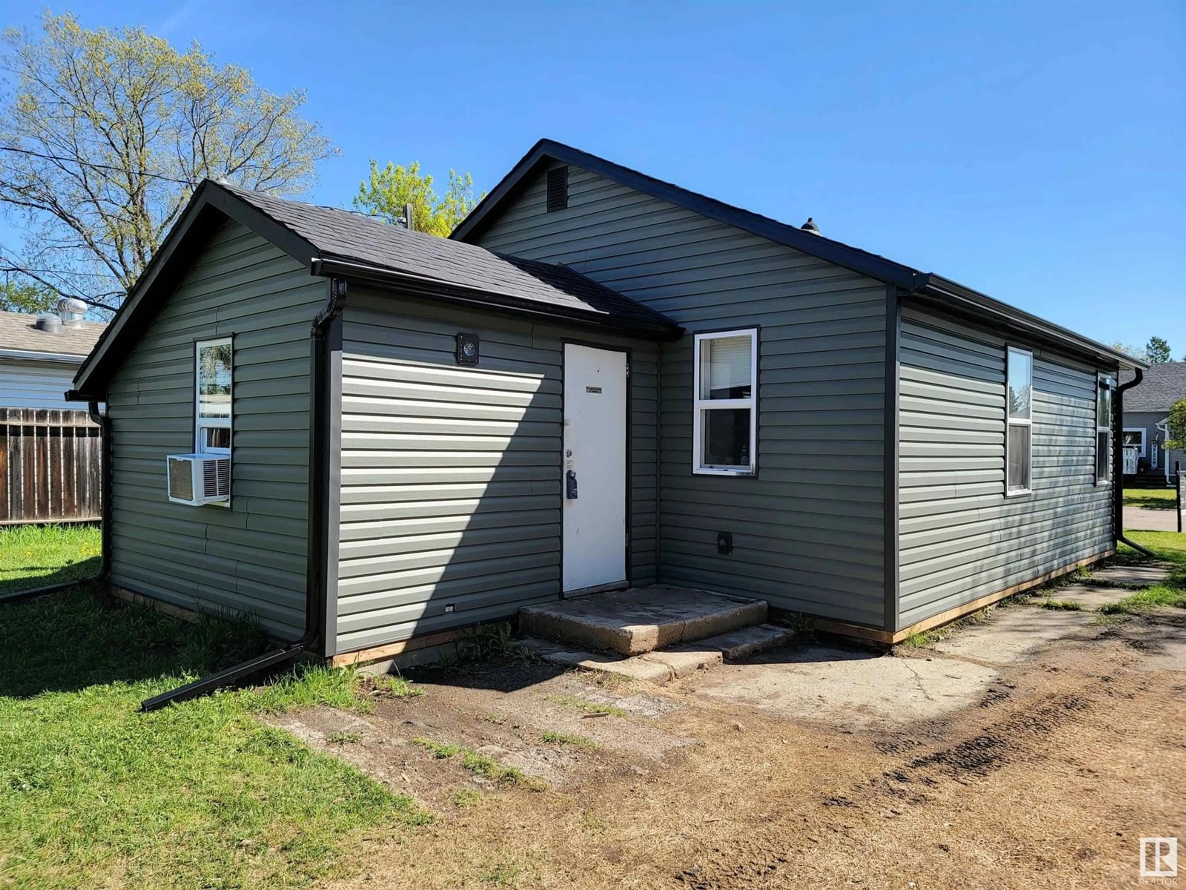 Home with vinyl exterior material, street for 4712 48 ST, Cold Lake Alberta T9M1Y4