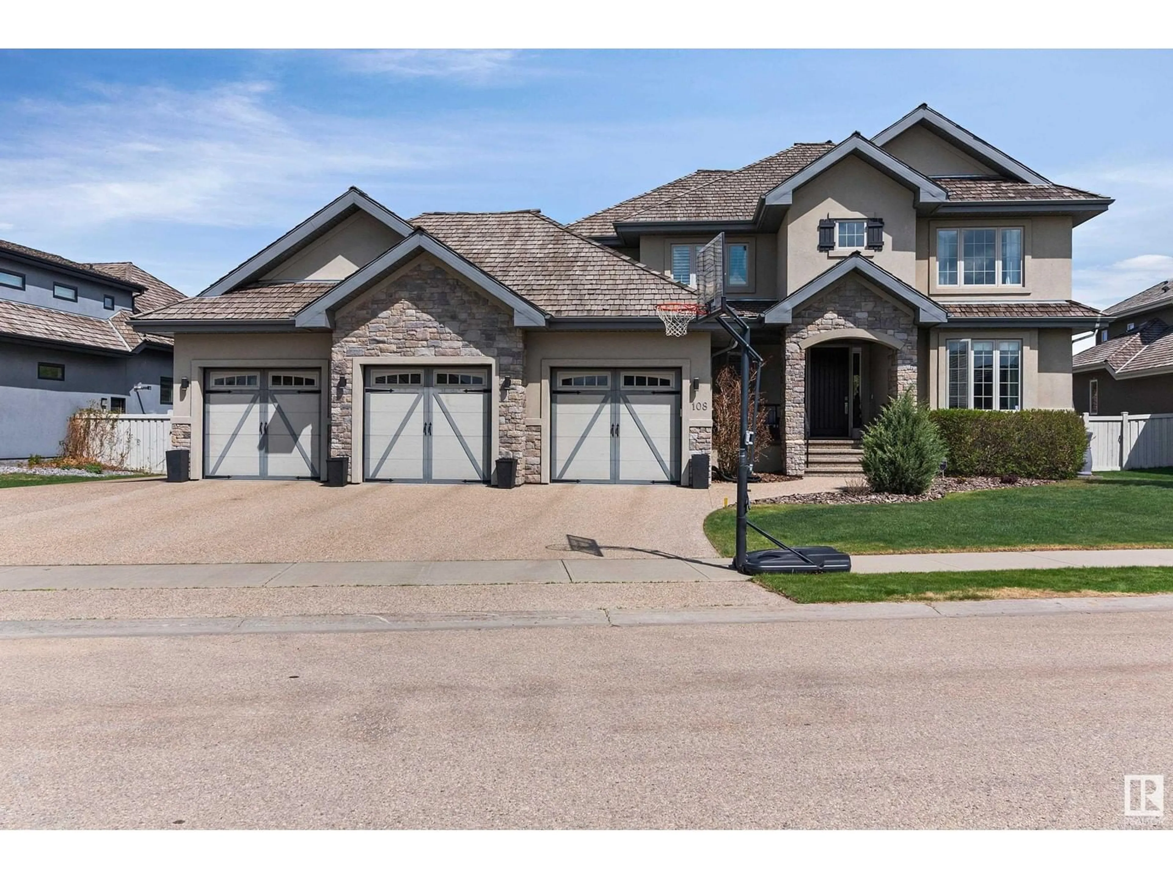 Home with brick exterior material, street for #108 - 52328 RANGE ROAD 233, Rural Strathcona County Alberta T8B0A2
