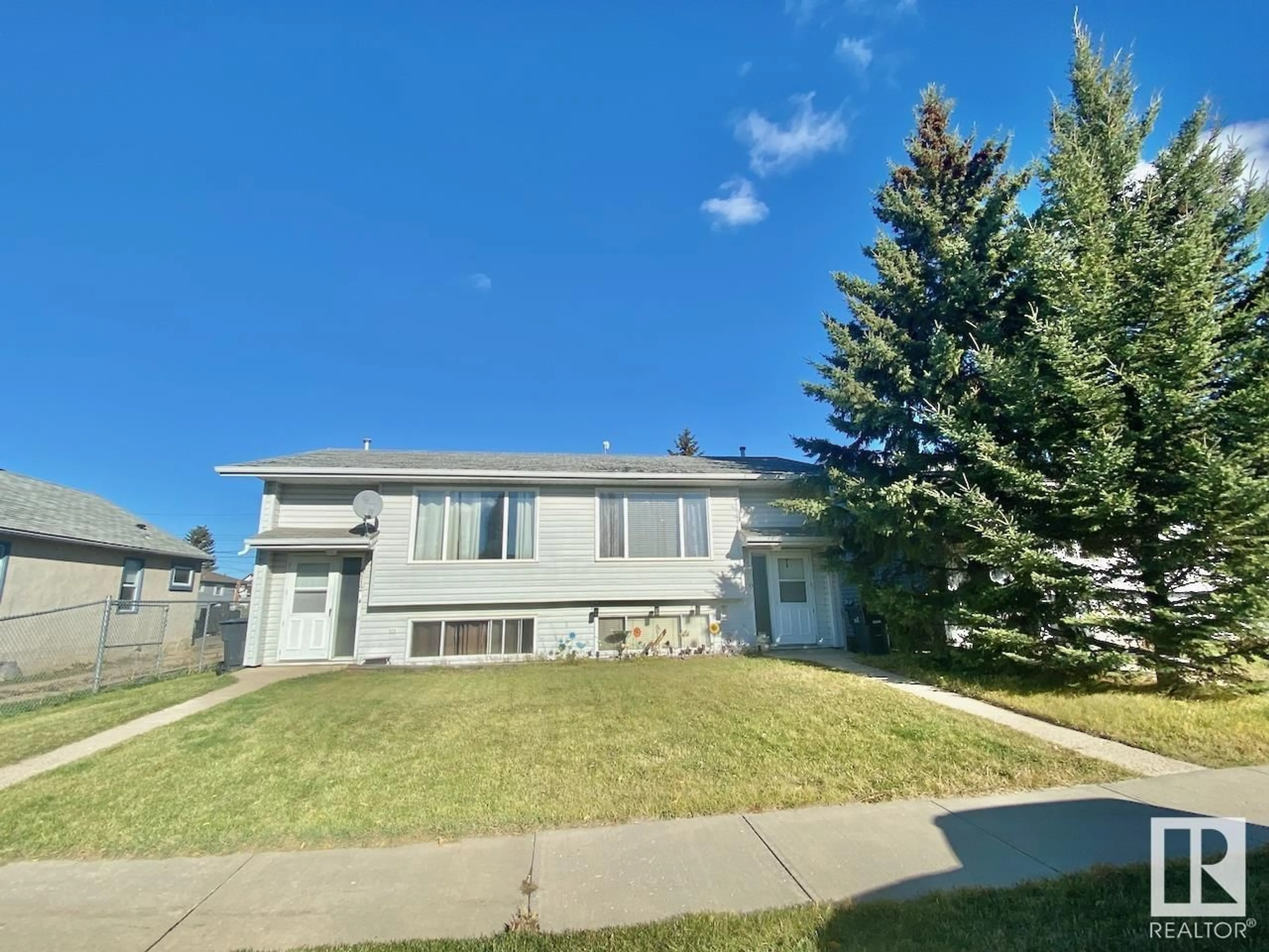 Home with vinyl exterior material, street for 5110 -5112 48 AV, St. Paul Town Alberta T0A3A0