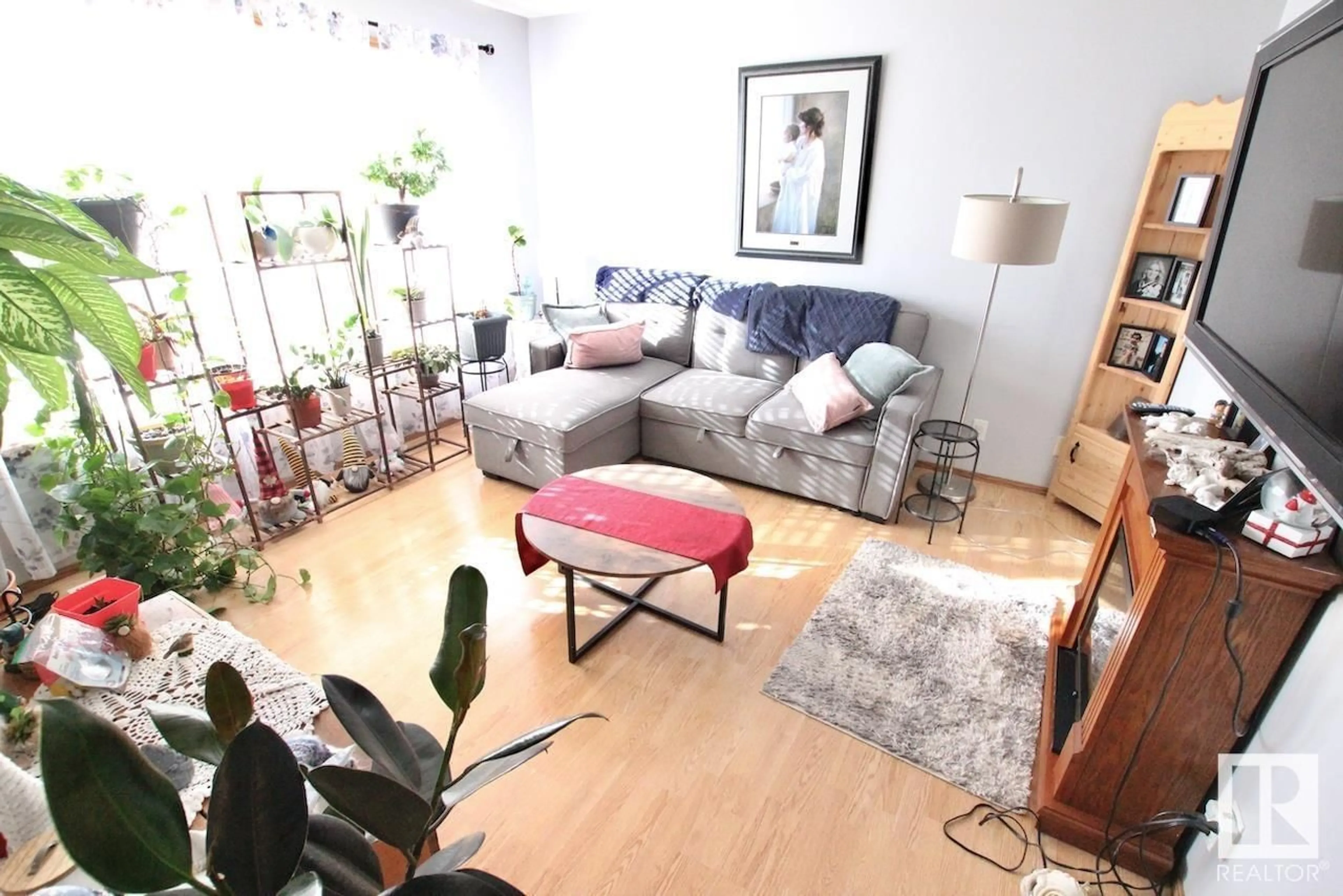Living room with furniture, unknown for 5110 -5112 48 AV, St. Paul Town Alberta T0A3A0