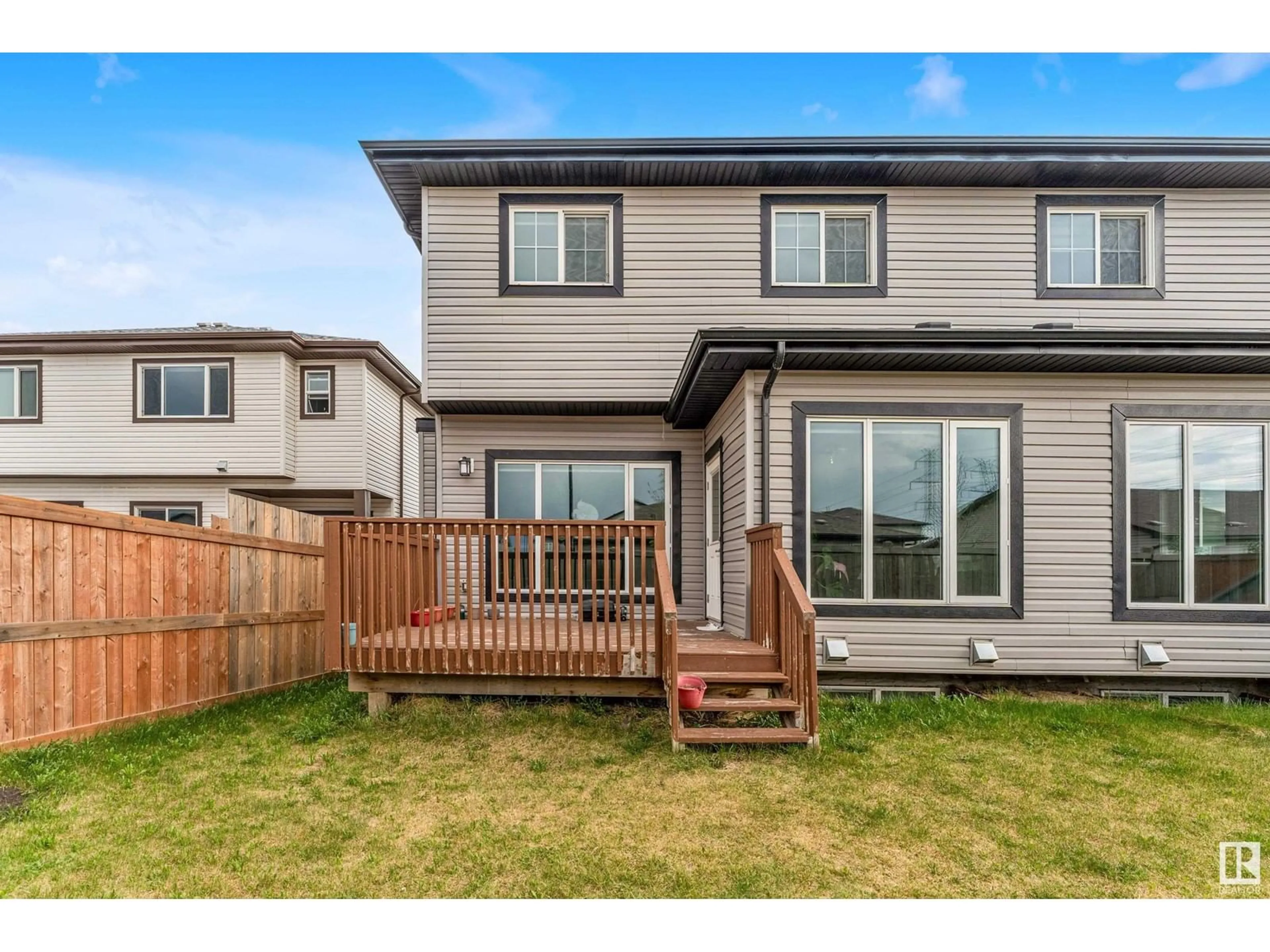 Home with vinyl exterior material, street for 2616 22 AV, Edmonton Alberta T6T0Y5