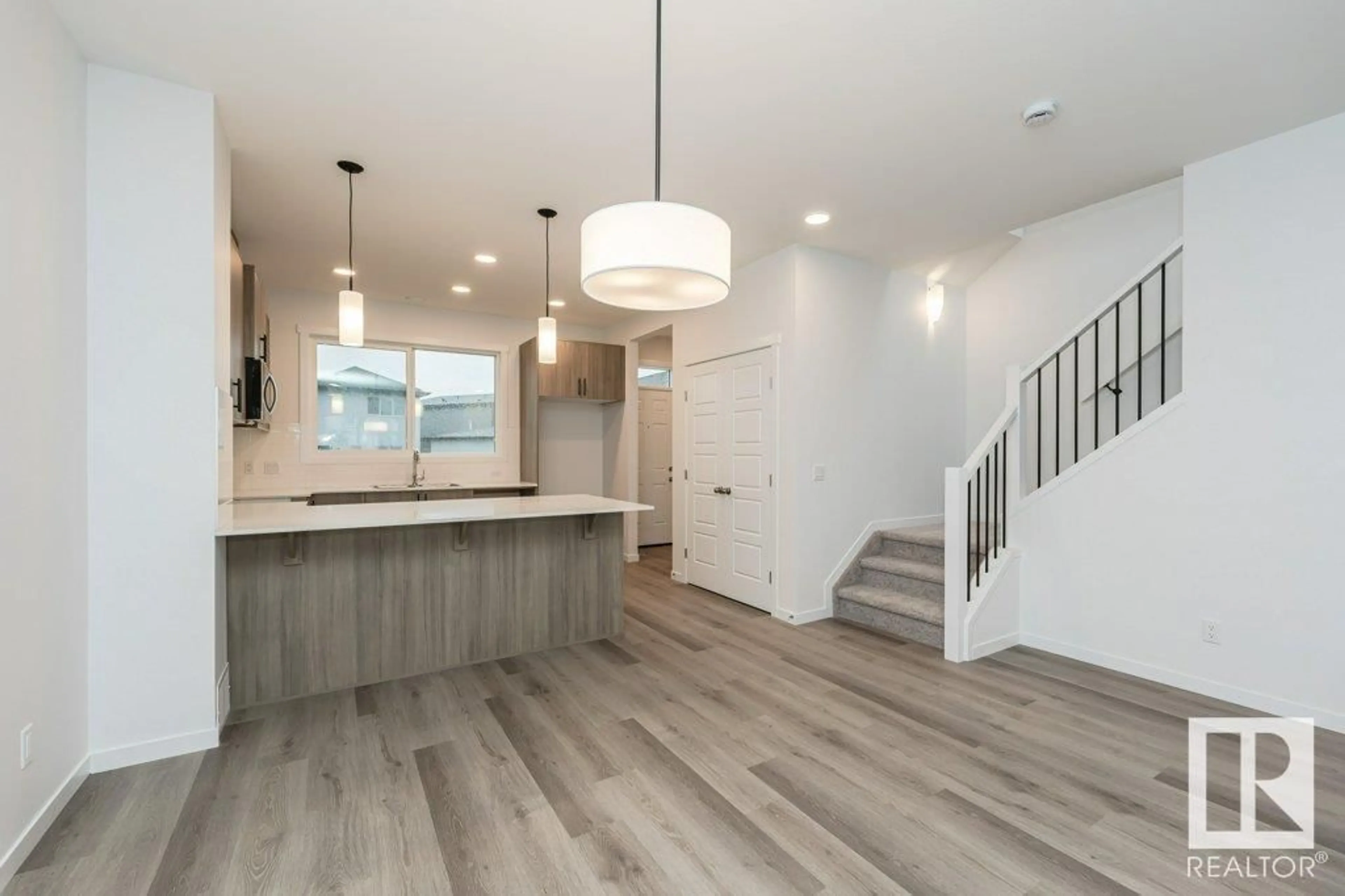 Open concept kitchen, unknown for 6253 175A AV, Edmonton Alberta T5Y4A5
