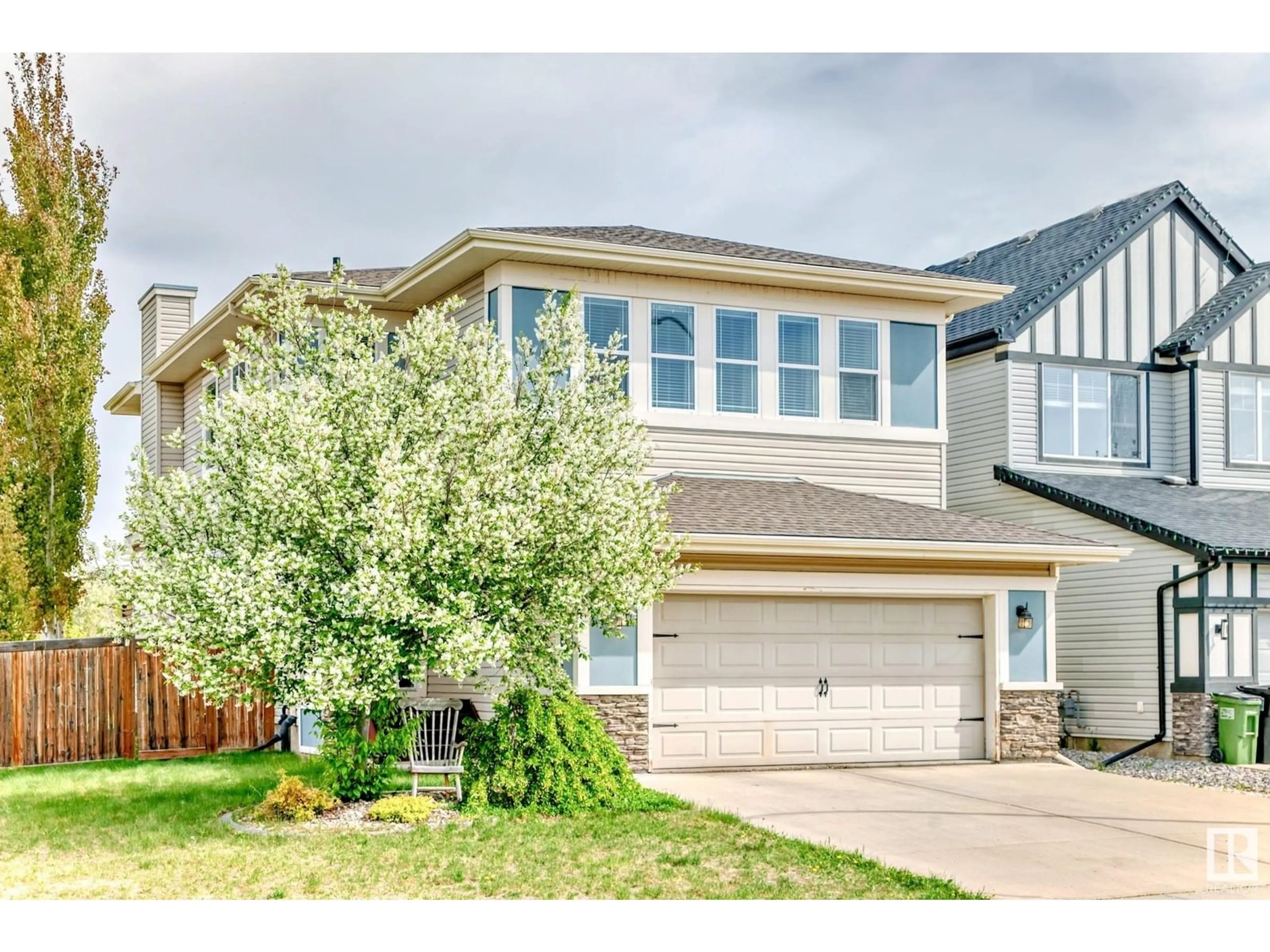 Home with vinyl exterior material, street for 22030 95A AV, Edmonton Alberta T5T4A9