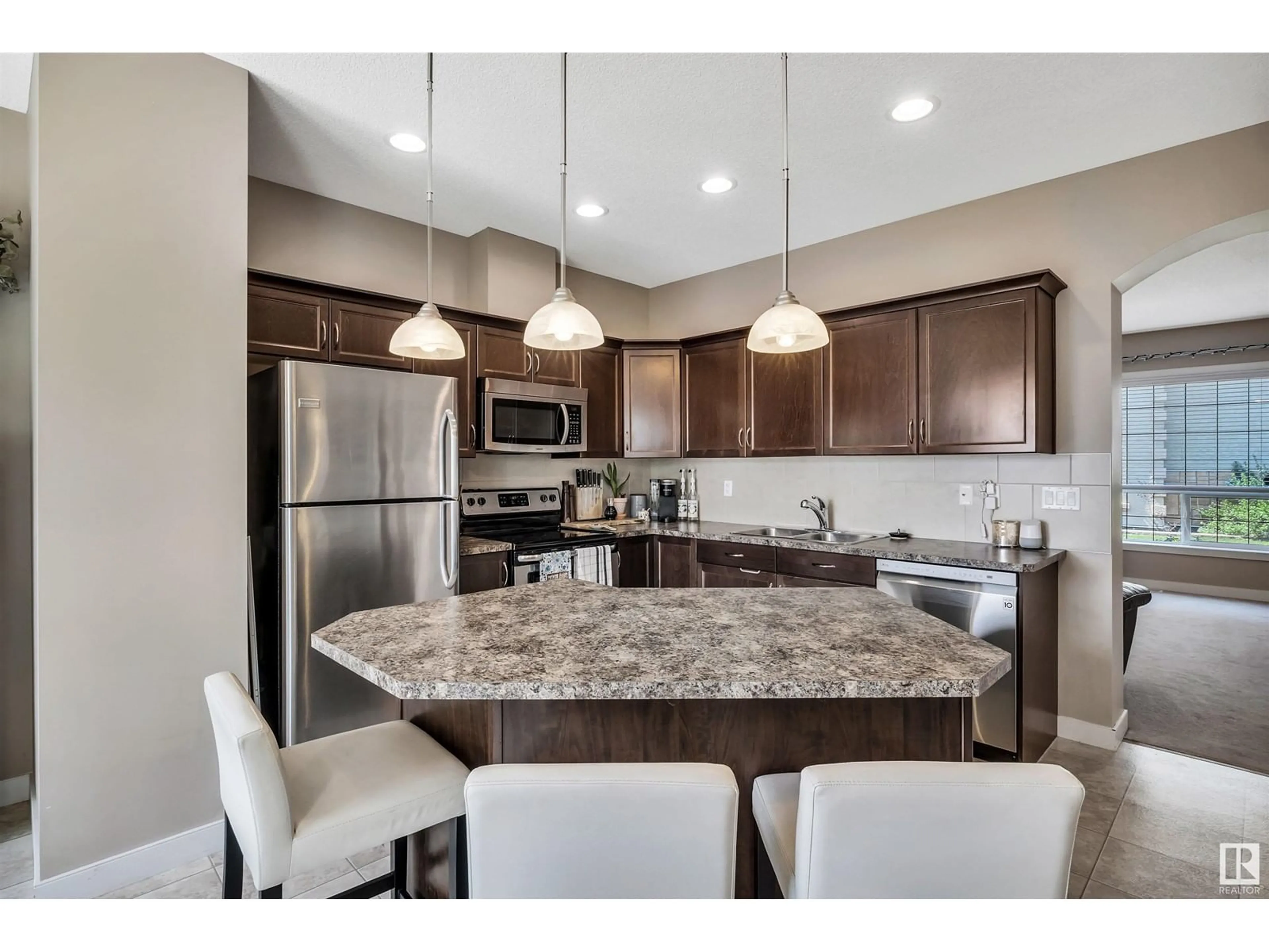 Open concept kitchen, ceramic/tile floor for #5 - 13825 155 AV, Edmonton Alberta T6V0B8